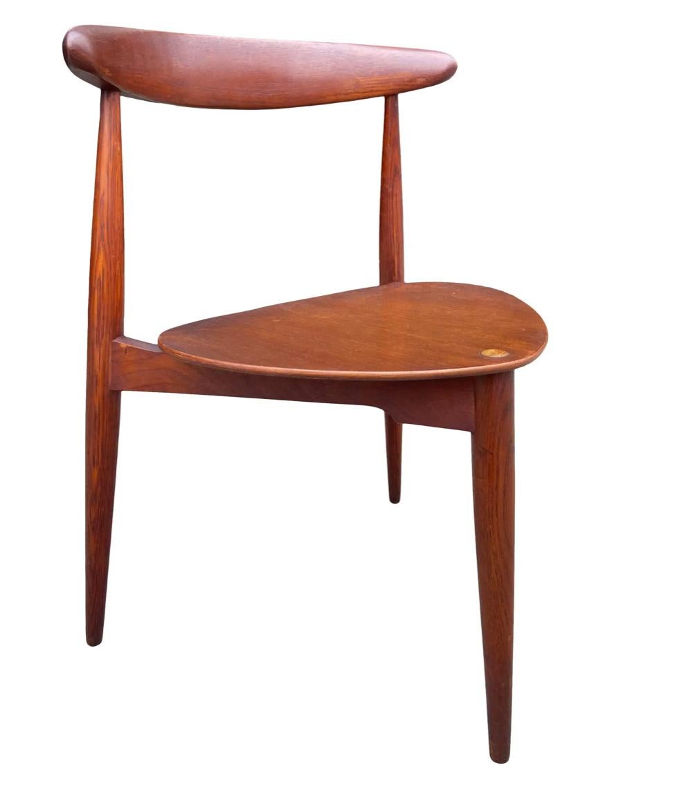 For your consideration are these beautiful dining chairs designed by Hans Wegner. Having gorgeous original patina with splendid craftsmanship while utilizing a space saving design. Unusual and rare that these chairs are all teak as opposed to a mix