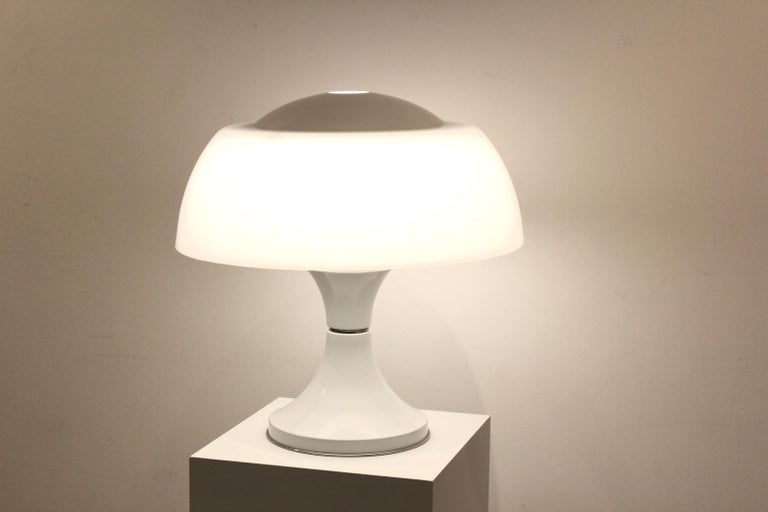 Characteristic mushroom table lamp designed by Geatano Sciolari for Valenti in 1968. The lamp is quite large and is made of a white steel lamp-base with a mat finish and chrome accents. The lamp has an internal opaline glass diffuser with a perspex