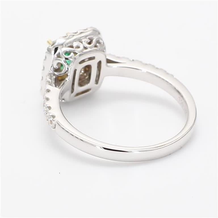 Contemporary Natural Emerald Cut Emerald and White Diamond .89 Carat TW Gold Cocktail Ring For Sale
