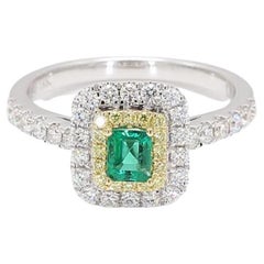 Natural Emerald Cut Emerald and White Diamond .89 Carat TW Gold Cocktail Ring