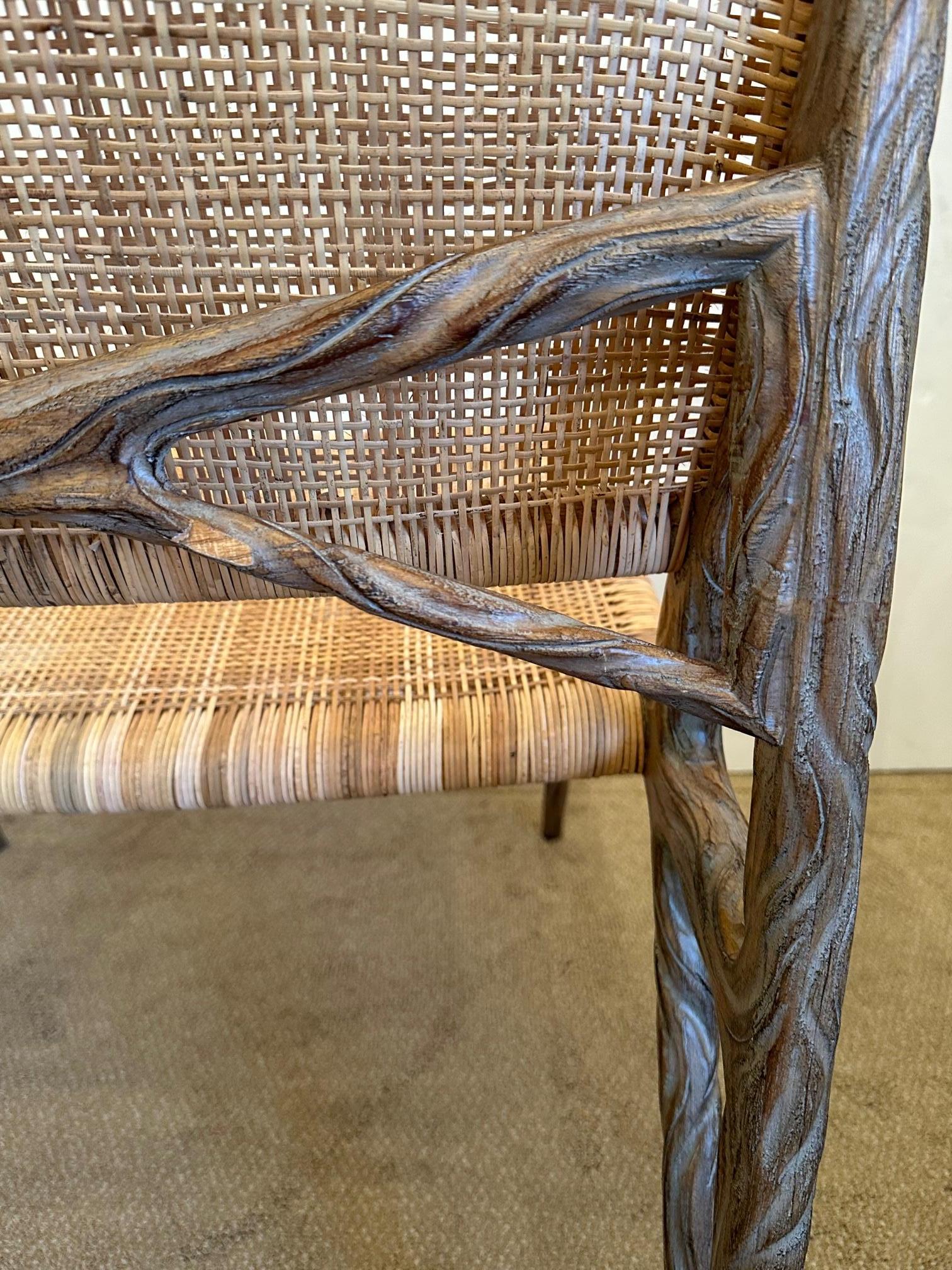Superb organic modern occasional chair having sculptural faux bois twig like structure and shapely legs with woven natural colored rattan seat and back. This is the favorite chair in a room for it's forward design and natural feel.
Seat height and