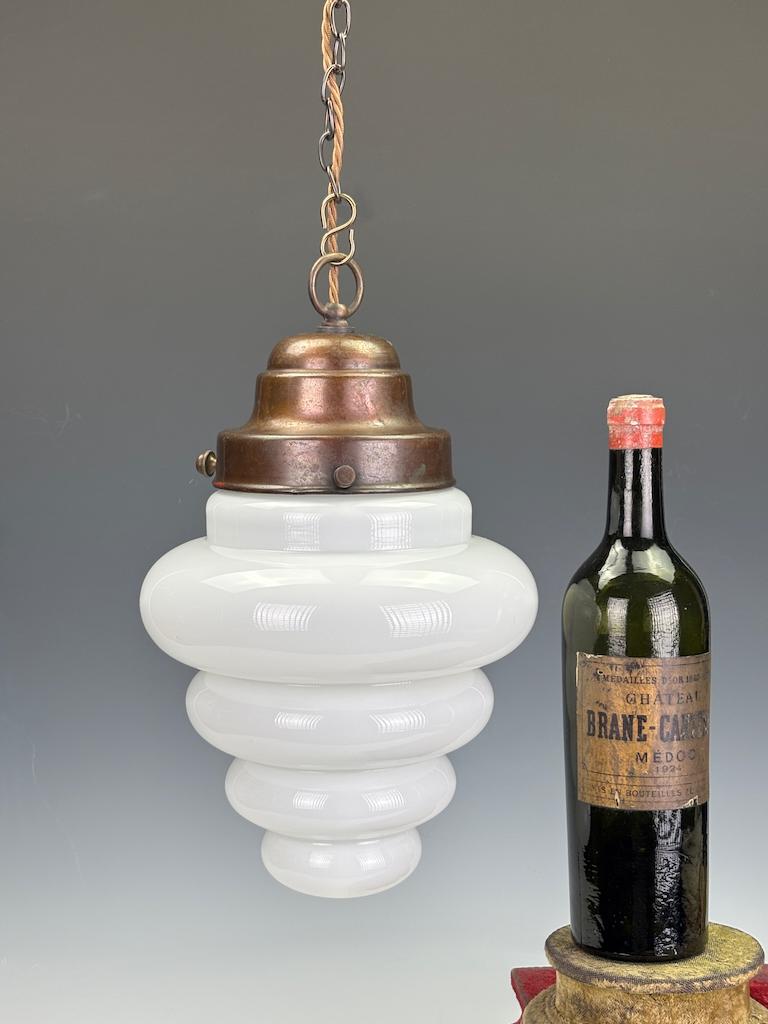 Superb Original Art Deco Pendant Light with Stepped Opaline Glass Shade and Bronze Gallery, c. 1930

A striking and authentic example of early 20th-century design, this original Art Deco pendant light features a beautifully tiered opaline glass
