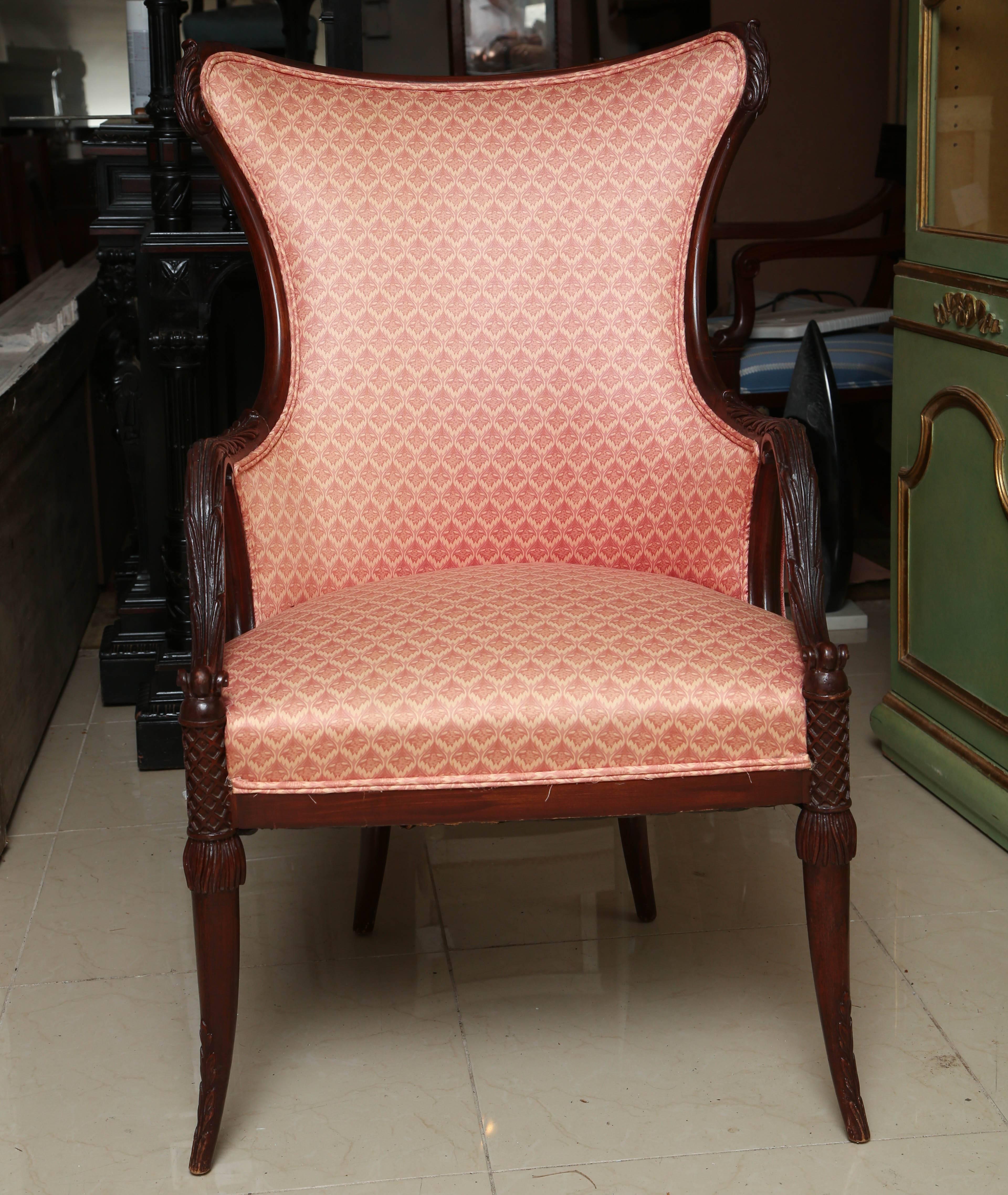 These are a very nice pair of vintage arm chairs in mahogany, the curved backs with leaf carved arms circular slightly flared and tapered legs. The fabric is very good and the chairs are very sturdy and in good condition.
Measures: Height of back