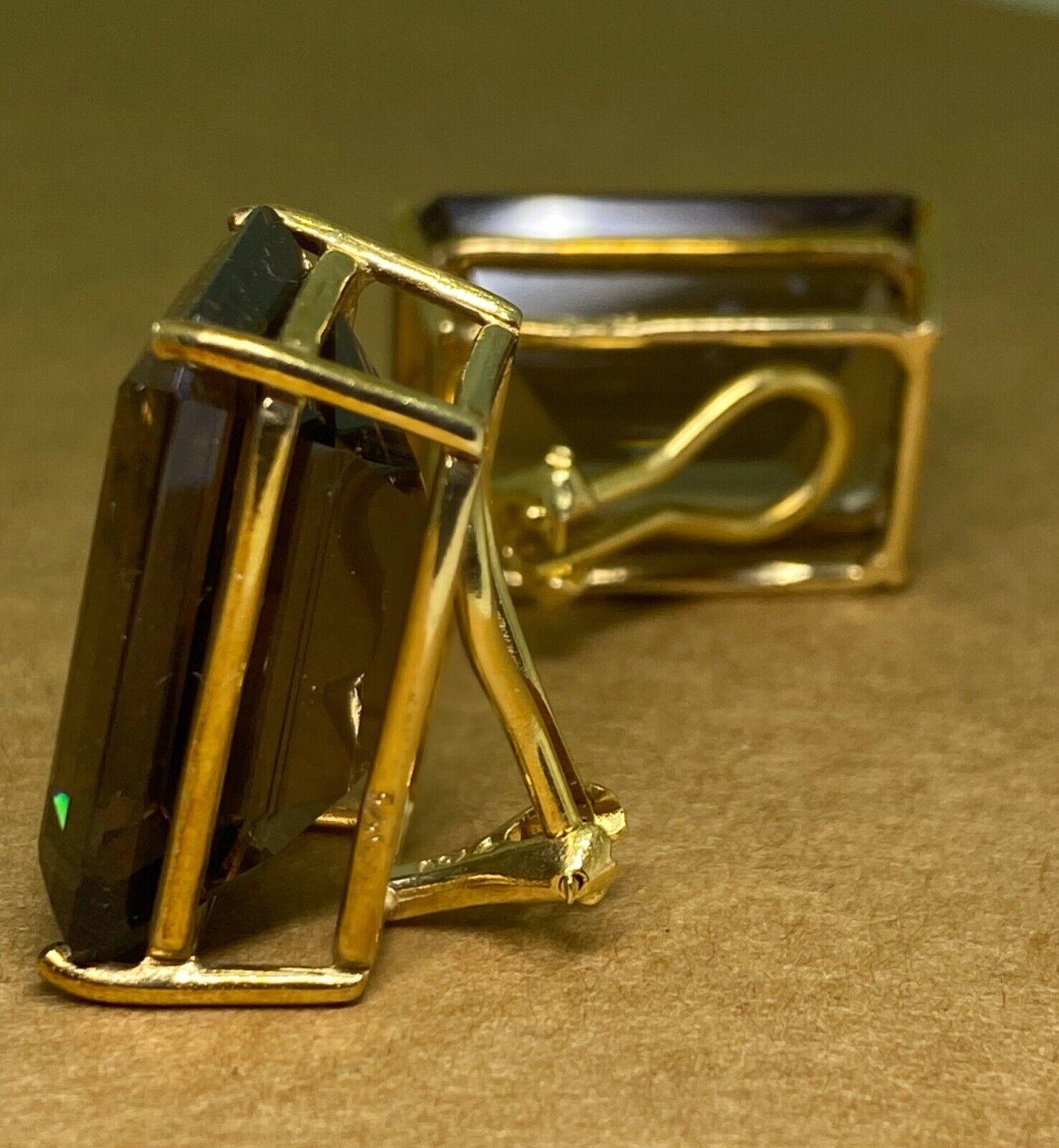Superbe paire de boucles d'oreilles clips en or jaune et topaze fumée taille émeraude de 40.00ct Pour femmes en vente