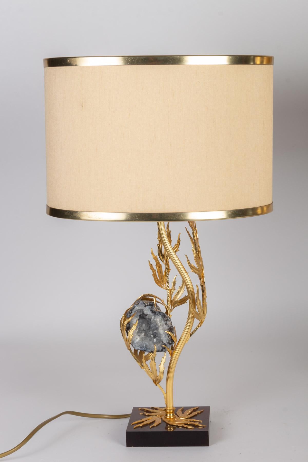 Superb pair of gilt brass and Celestite (also called Celestine) lamps attributed to Willy Daro, on brown lucite base France, 1960s-1970s
They are marked Lucifer on the base, and the flames ascending from the base up to the celestite which