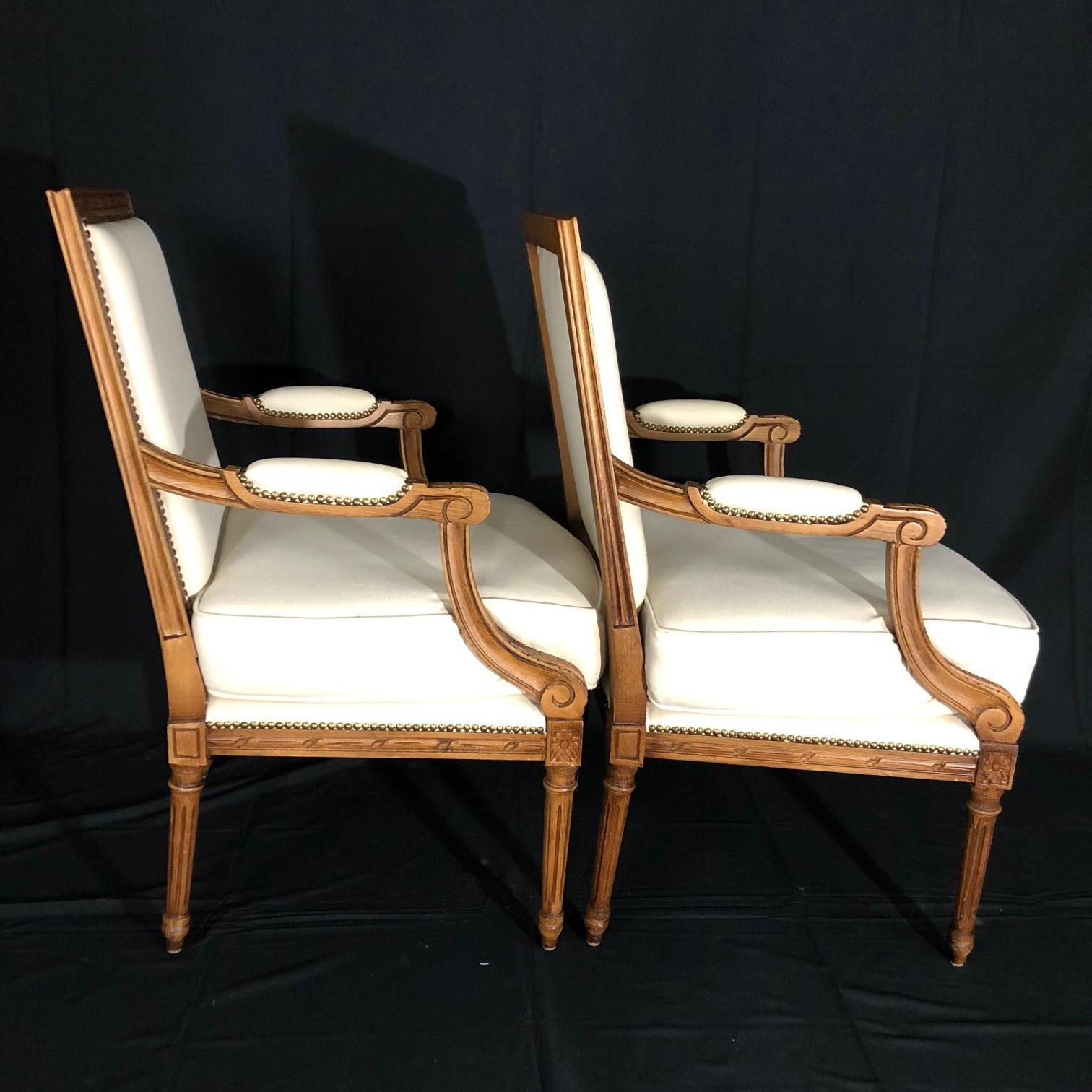 Mid-20th Century Superb Pair of Italian Carved Walnut Armchairs Bergeres with New Upholstery