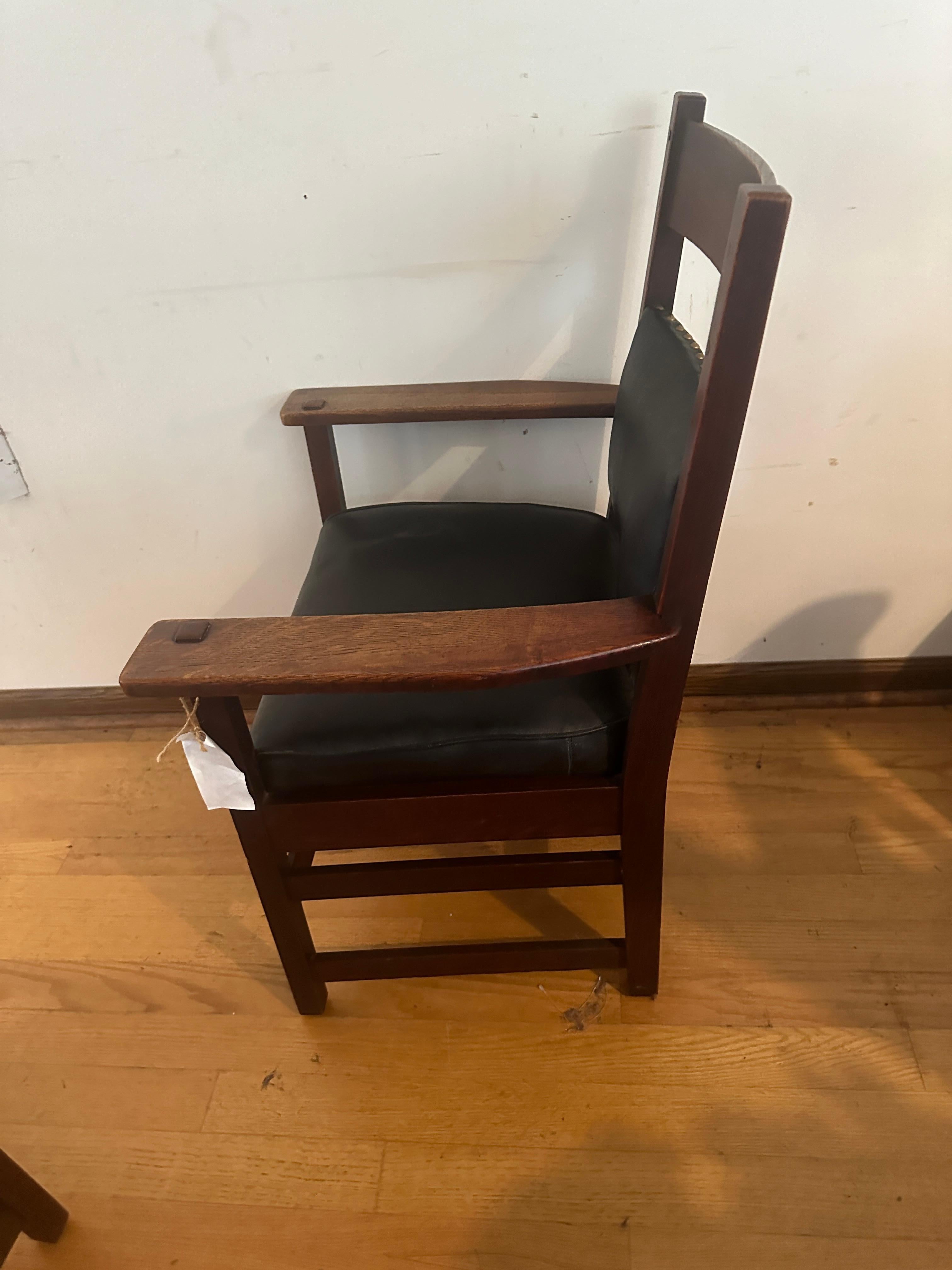 SUPERB Pair (2) of L&JG Stickley Chairs MODEL 848, made circa 1910.  They have the original finish with an original spring seat.  This piece is signed with an L&JG Stickley Brand. These pieces are STURDY AND STRONG and ready for use in your home or
