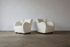 Superbe paire de fauteuils de salon, tapissés en pure alpaga