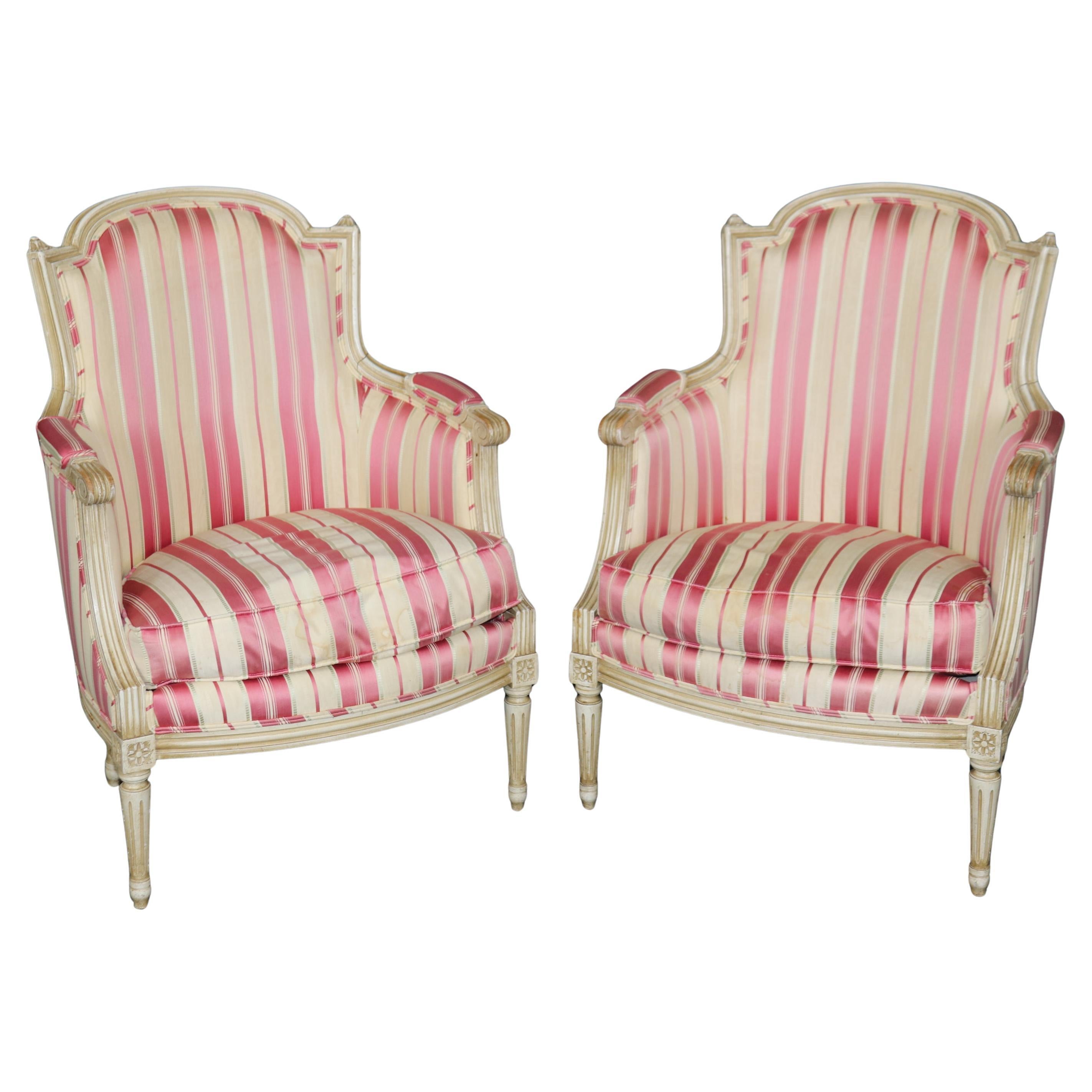 Superb Pair of Paint Decorated White French Carved Louis XVI Bergere Chairs