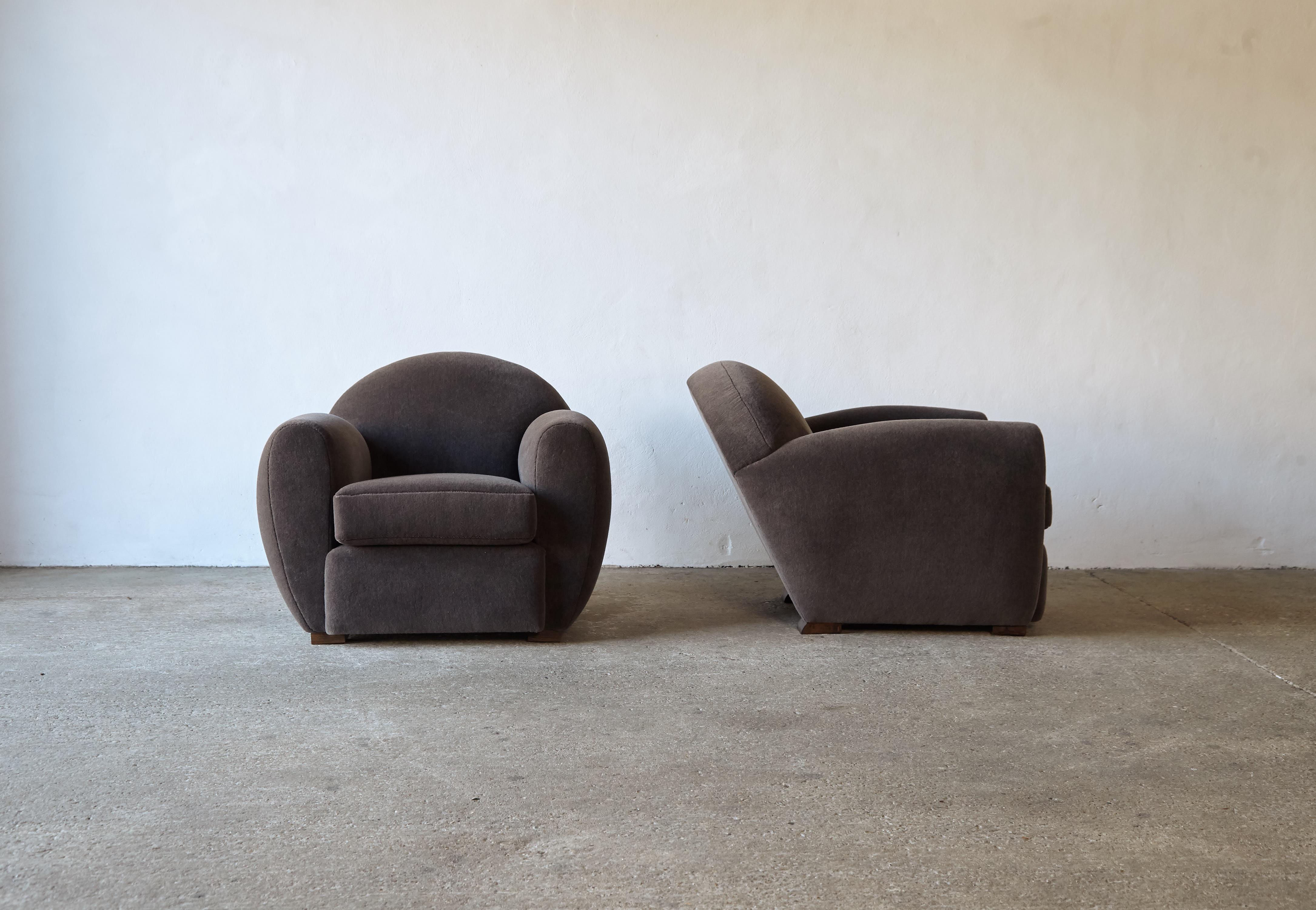 Superb pair of round, leaning modern club chairs, upholstered in pure Alpaca. High quality hand-made beech frames and newly upholstered in a soft, brown/grey premium 100% alpaca fabric. Fast shipping worldwide.



UK customers please note -