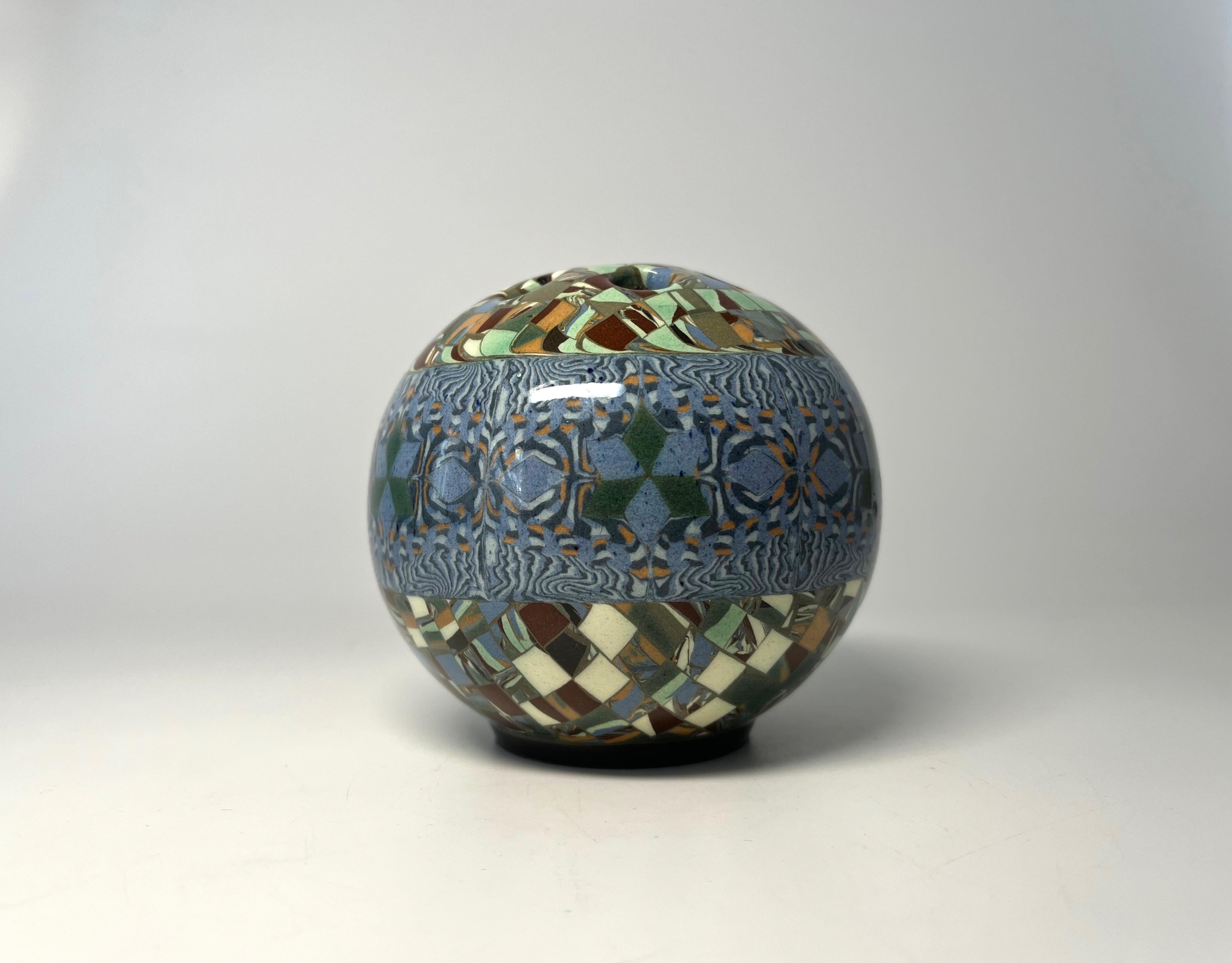 Petit diamond motif Jean Gerbino for Vallauris, France, ceramic glazed mosaic posy potpourri vase 
Wonderful patterns and colouring from Gerbino
Circa 1960's
Signed Gerbino  to base
Height 3.25 inch, Diameter 3.25 inch, 
In very good condition.