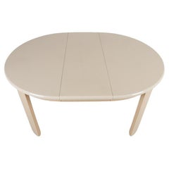 Superb Post modern gloss lacquer tan round oval dining table with 1 leaf
