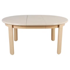 Superb Post modern gloss lacquer tan round oval dining table with 1 leaf