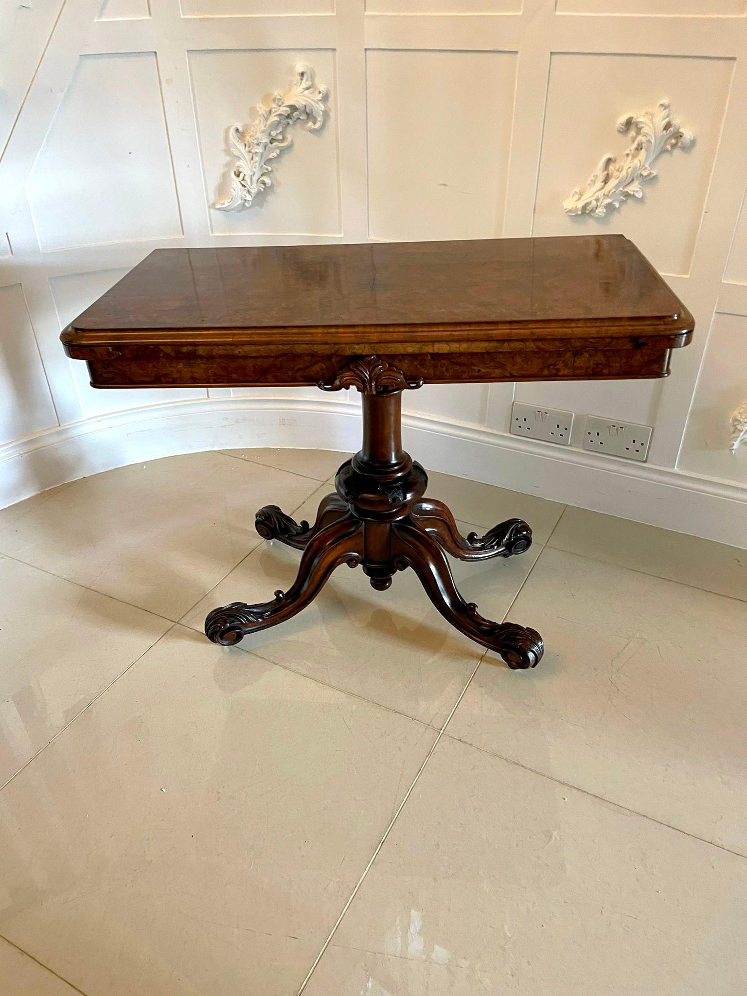 Superb quality antique Victorian burr walnut card table having a superb quality burr walnut fold over top opening to reveal a baize interior, burr walnut carved frieze supported by a turned shaped carved column standing on four shaped carved