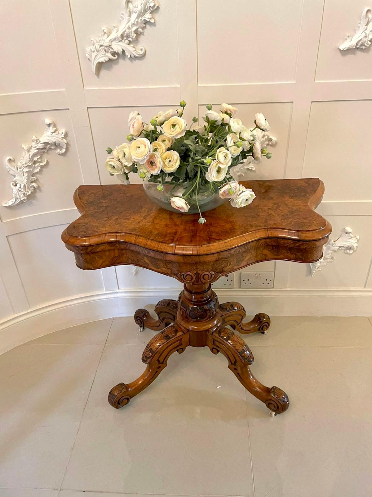 ??Superb quality antique Victorian burr walnut card table having a superb quality burr walnut serpentine shaped fold over and swizzle top with a moulded edge opening to reveal a green baize. It boasts a beautiful carved burr walnut serpentine shaped