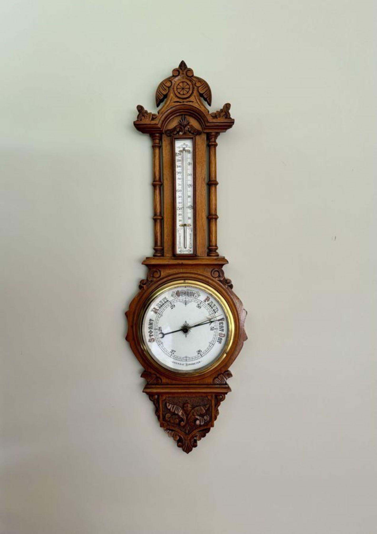 Superb quality antique Victorian carved oak banjo barometer having a quality carved oak case with scroll decoration with original brass bezel, porcelain dial and thermometer. In perfect working order and condition.

D. 1870
