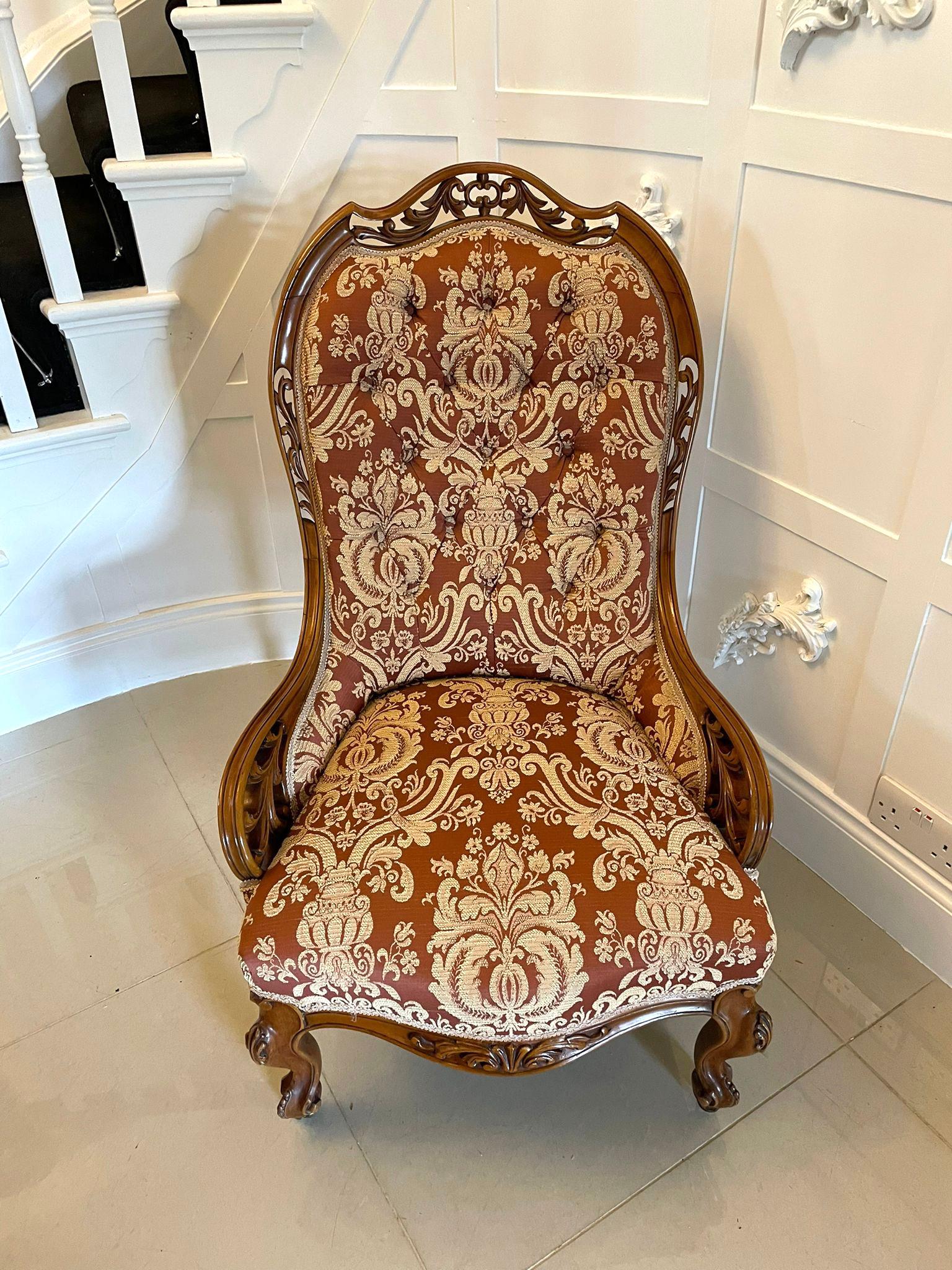 Superb quality antique Victorian carved walnut ladies chair having a superb quality carved solid walnut shaped buttoned back, serpentine seat standing on carved walnut shaped cabriole legs to the front and out swept back legs on original castors