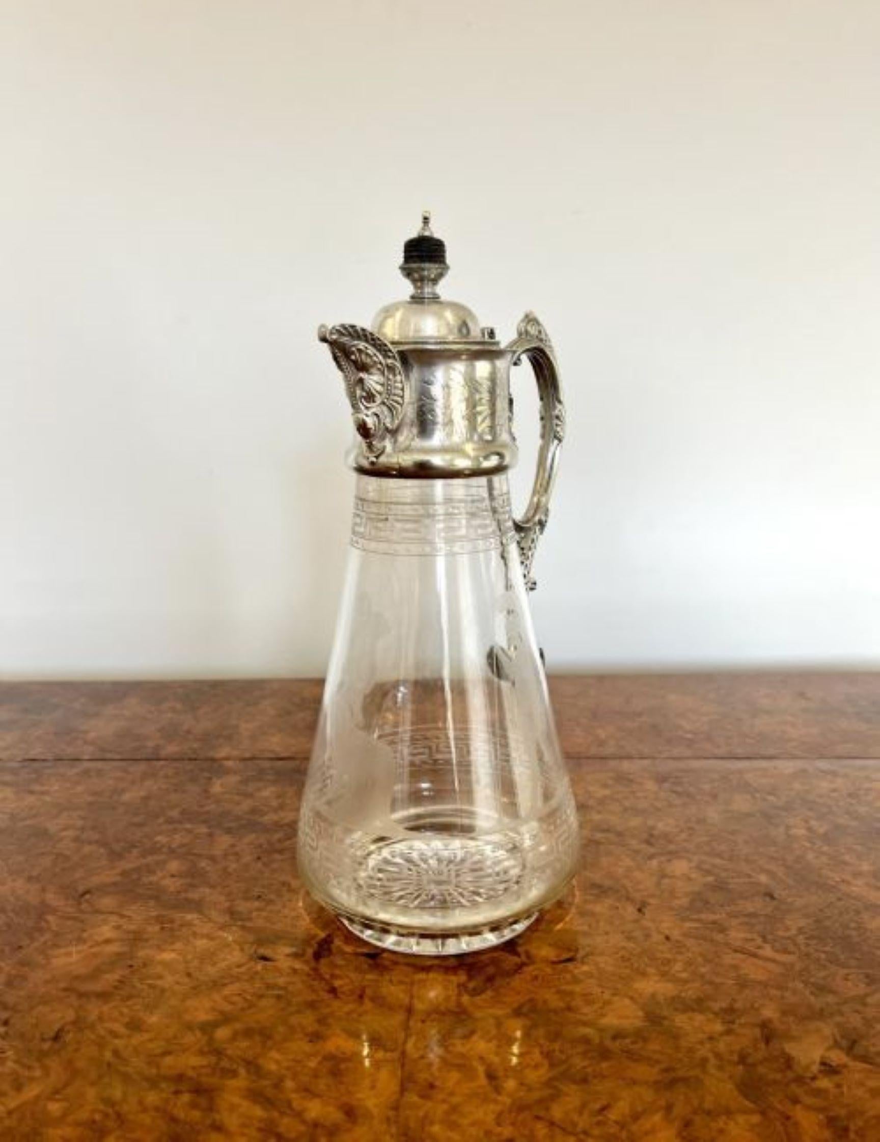 Superb quality antique Victorian glass and silver plated claret jug having a superb quality claret jug with a silver plated top, fantastic  ornate silver plated shaped spout and handle, above a fantastic engraved glass base with patterns and figures