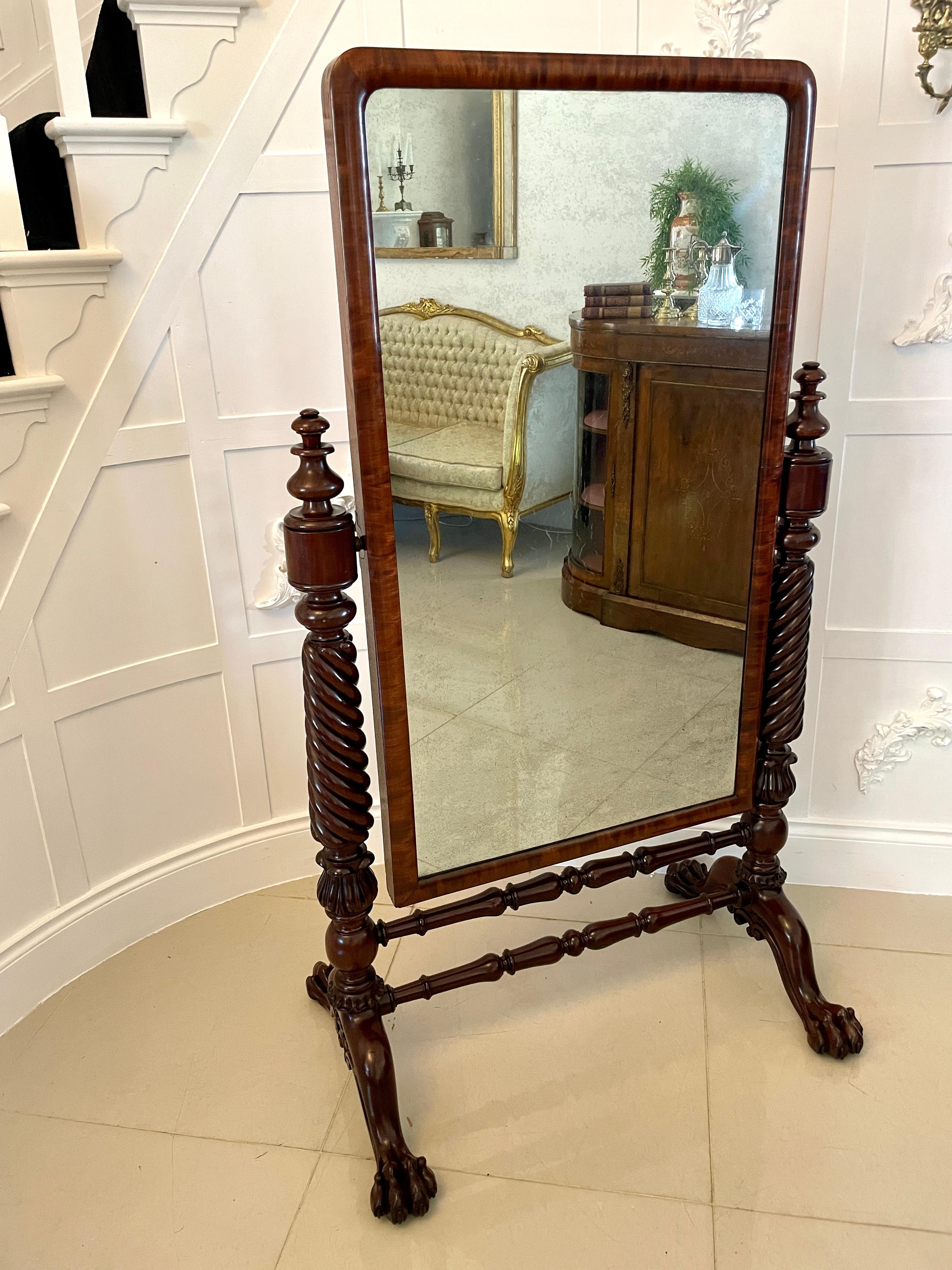 Superb quality antique William IV mahogany cheval mirror having a mahogany framed adjustable cheval mirror supported by superb quality rope twist carved column supports standing on carved mahogany shaped cabriole legs with claw feet united by two