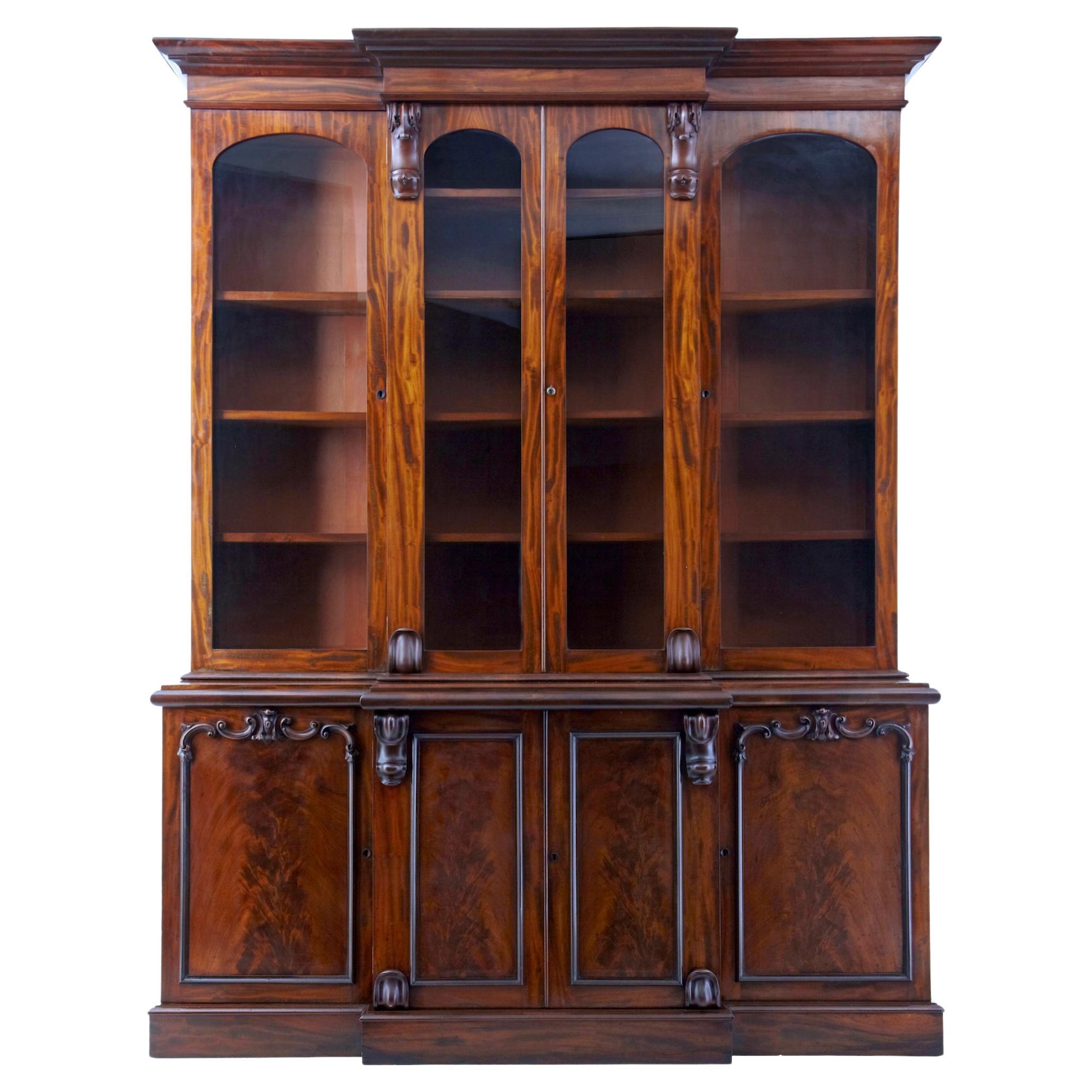 Superb quality early Victorian 19th century flame mahogany breakfront bookcase