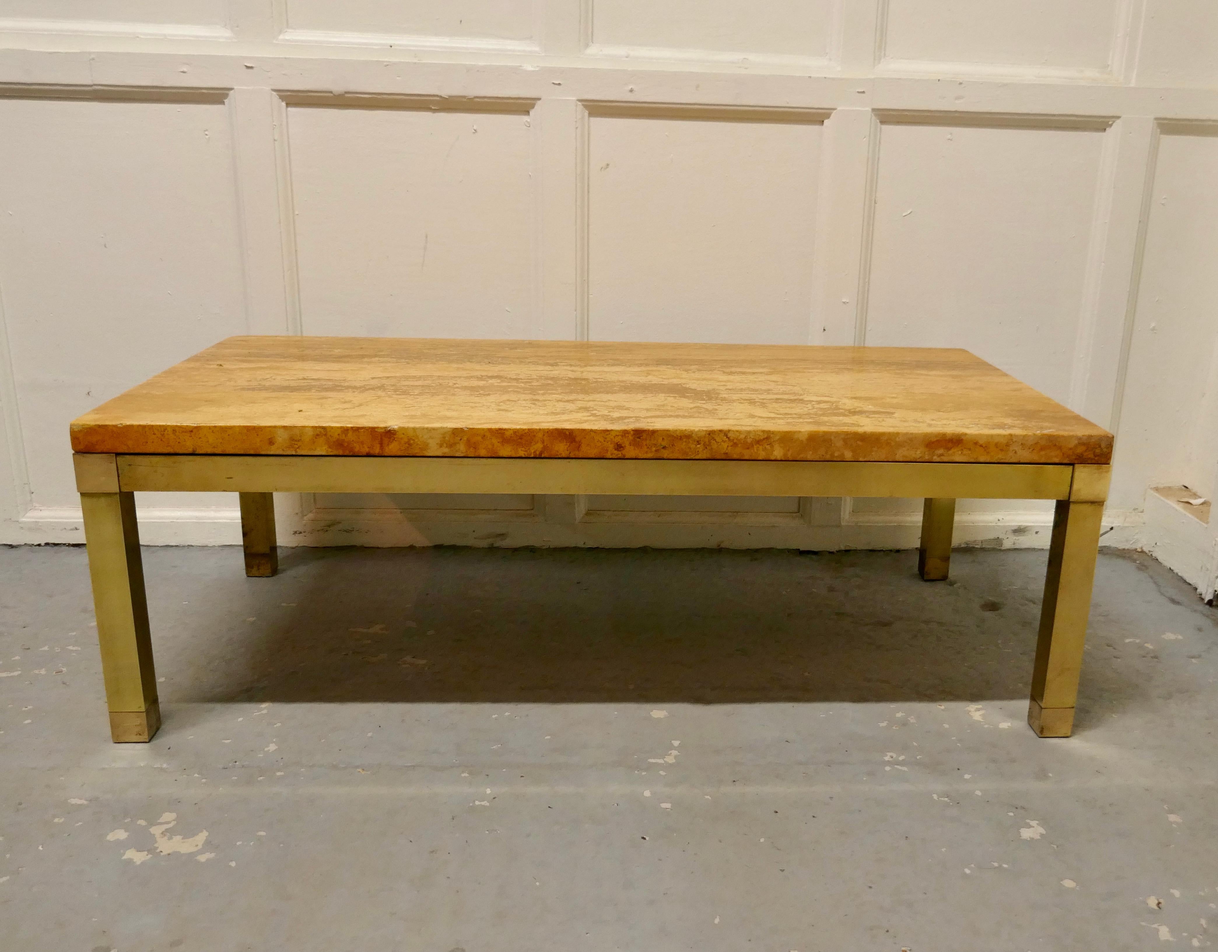 Superb quality French Art Deco brass and marble coffee table.

This is a a very attractive piece the base and legs are in square brass and the heavy figured marble top is in amber tones known as “Jasper Jaune”

A good looking piece it is sound