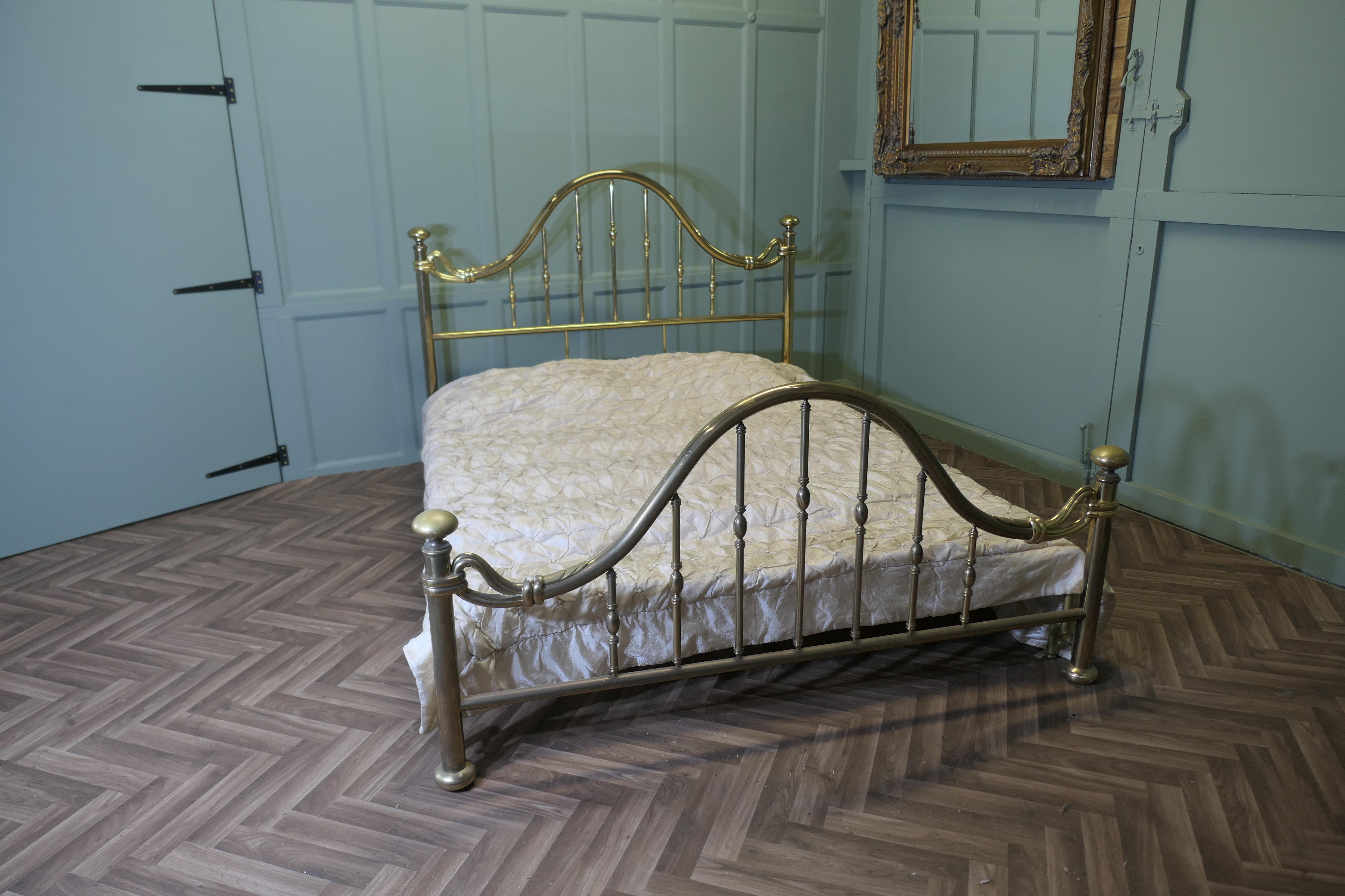 Superb Quality French Long King Size Brass Bed

Both ends of this superb bed have an arched top rail, brass spindles and chunky knobs at each end
The bed is good heavy quality and is in excellent condition, it is a large extra long size, a divan or