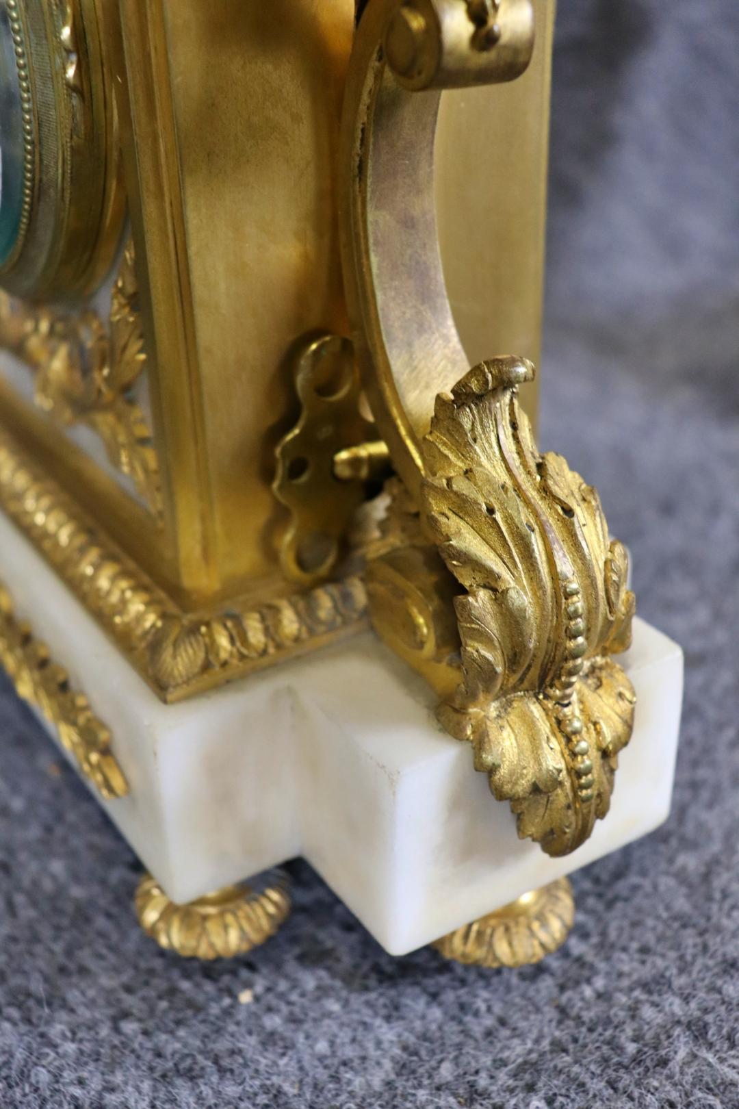 Superb Quality French Louis XV Bronze and White Marble Clock Set For Sale 6