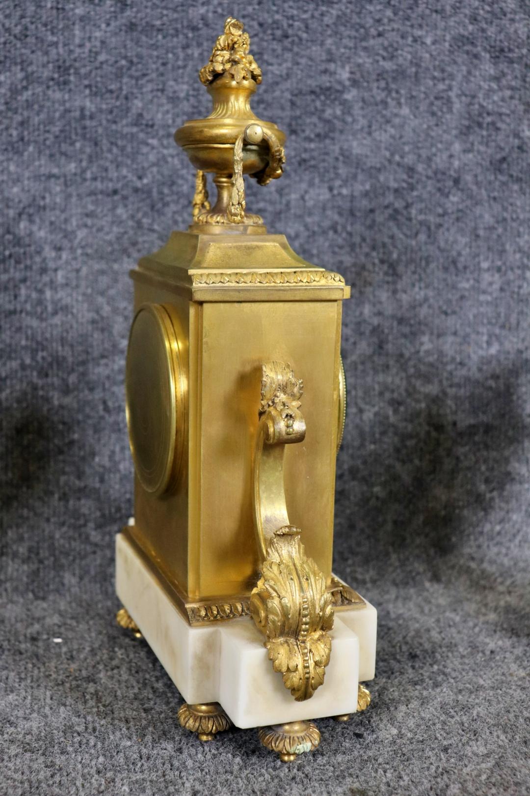 Superb Quality French Louis XV Bronze and White Marble Clock Set For Sale 2