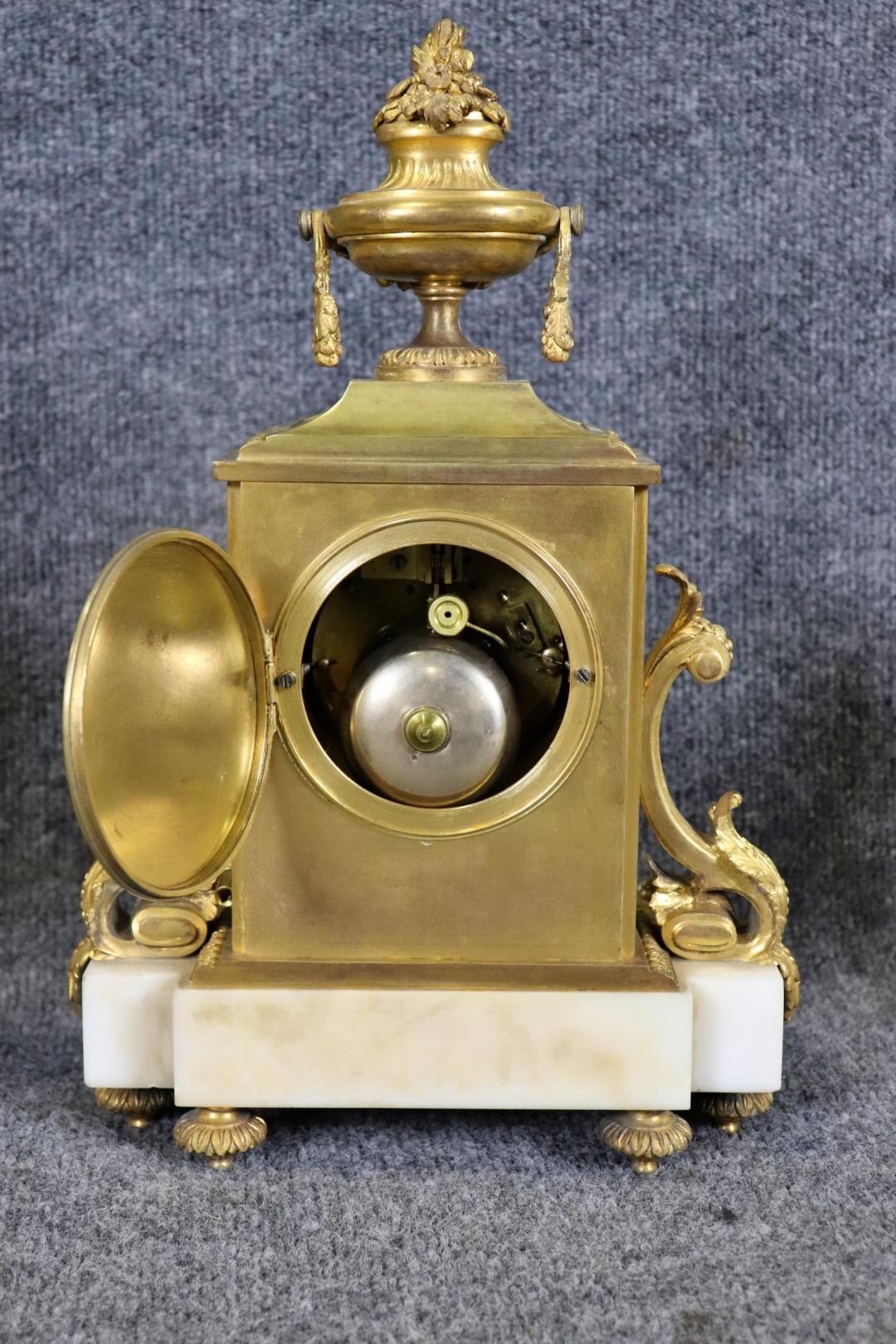 Superb Quality French Louis XV Bronze and White Marble Clock Set For Sale 3
