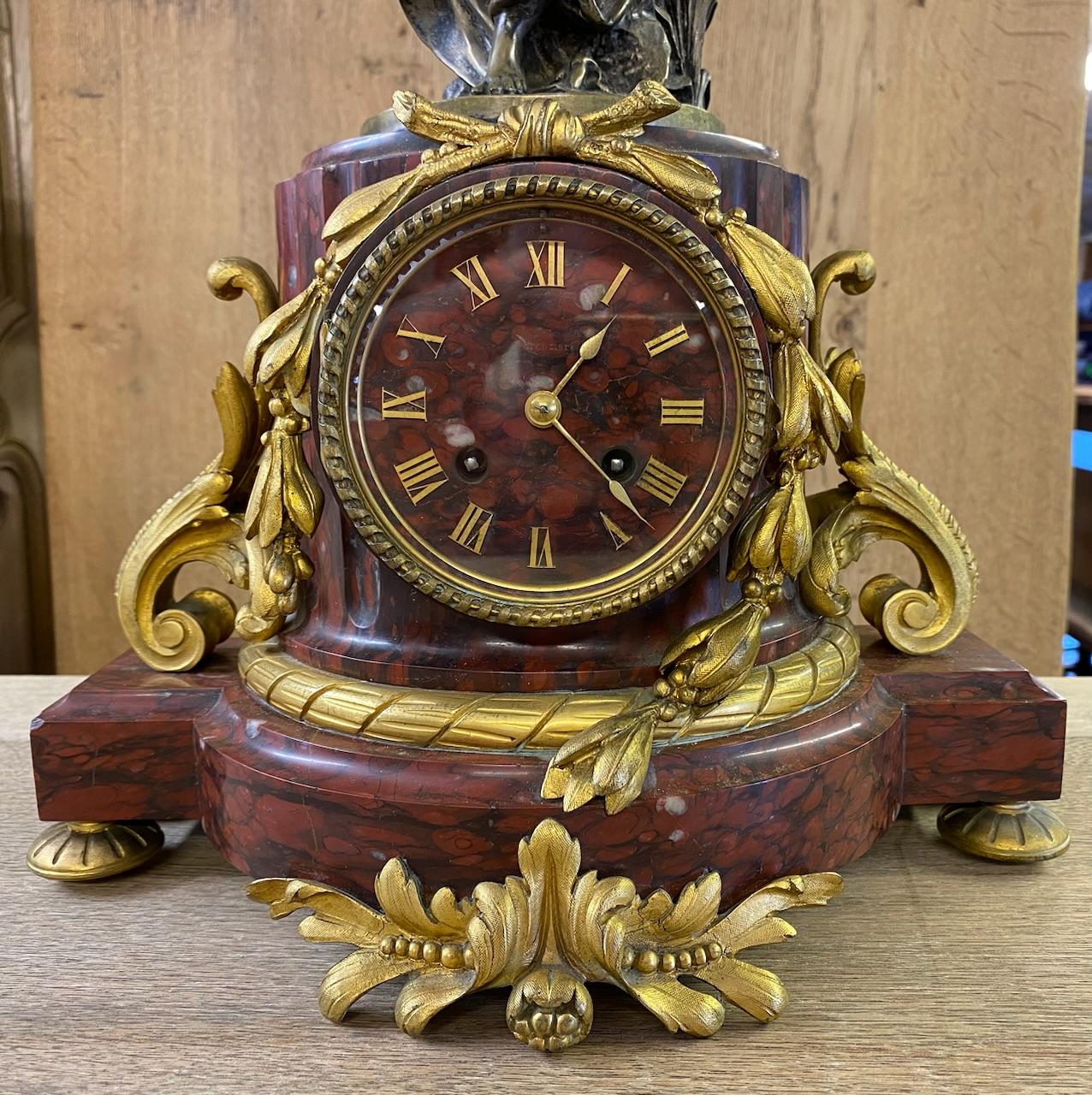 A truly superb quality French Rouge Marble and Ormolu mounted clock with a Classical Bronze Maiden on top.
We have not tested the movement but it is original and if you required it working a good service with a clock specialist would be