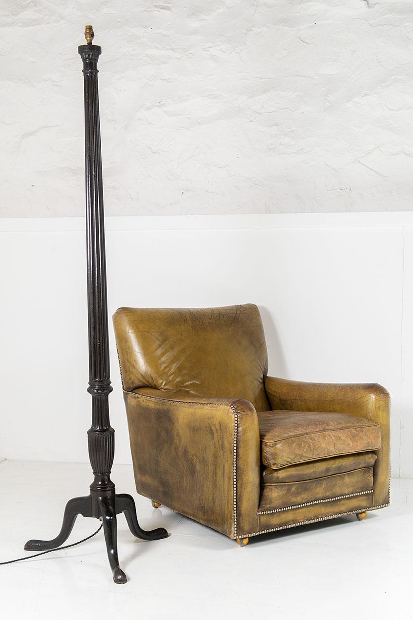 An exceptional Victorian mahogany floor lamp with great form and colour. Rarely do you find a lamp that has such perfect scale and form, this example has it all. Carved leaf Echinus detail with small rope twist collar leading to a fully fluted