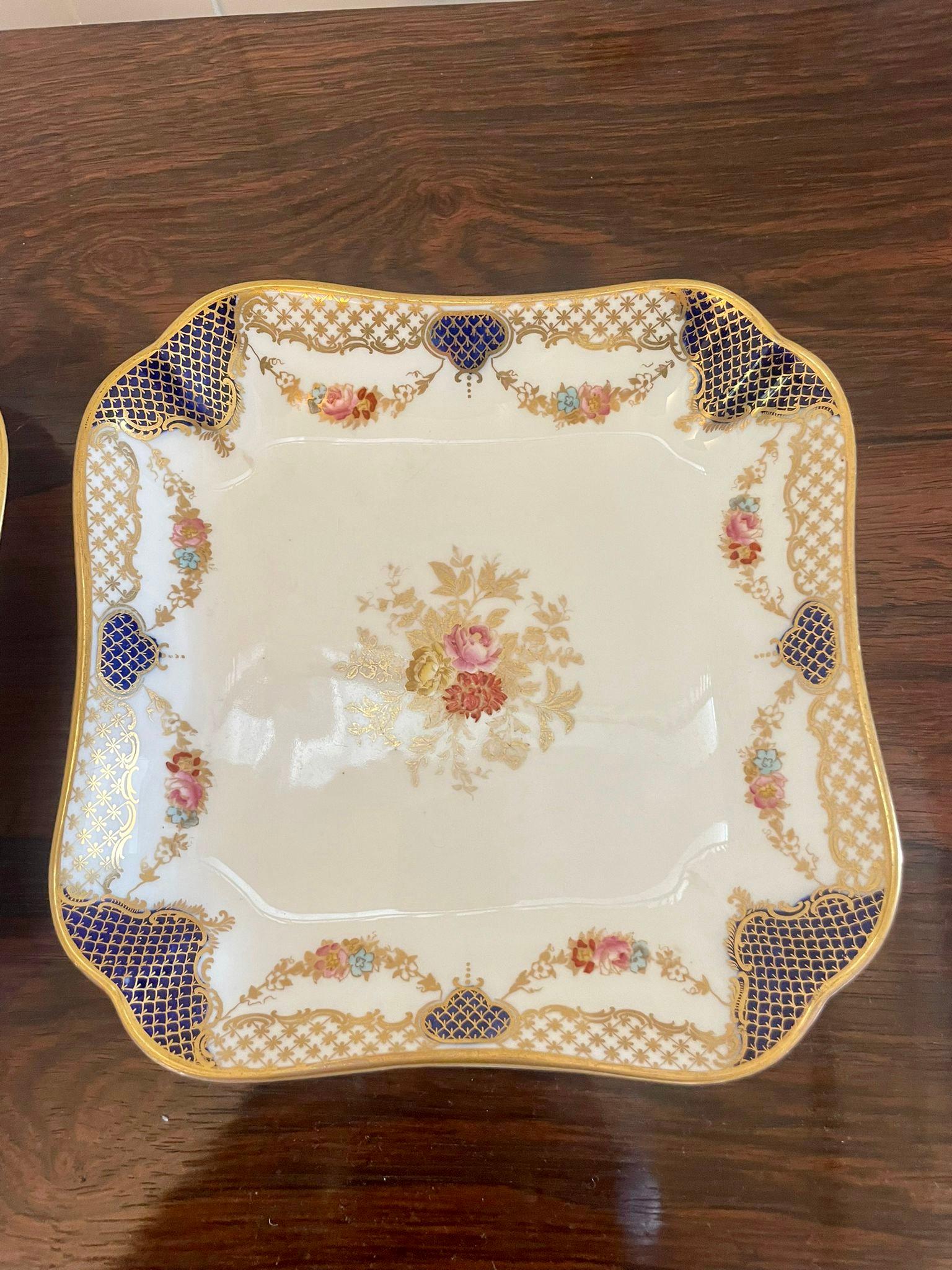 Superb quality pair of antique Edwardian hand painted Wedgwood shaped dishes having a pair of antique Edwardian Wedgwood shaped dishes with fantastic quality hand painted decoration in red, pink, yellow, blue and gold colours 


Charming dishes in