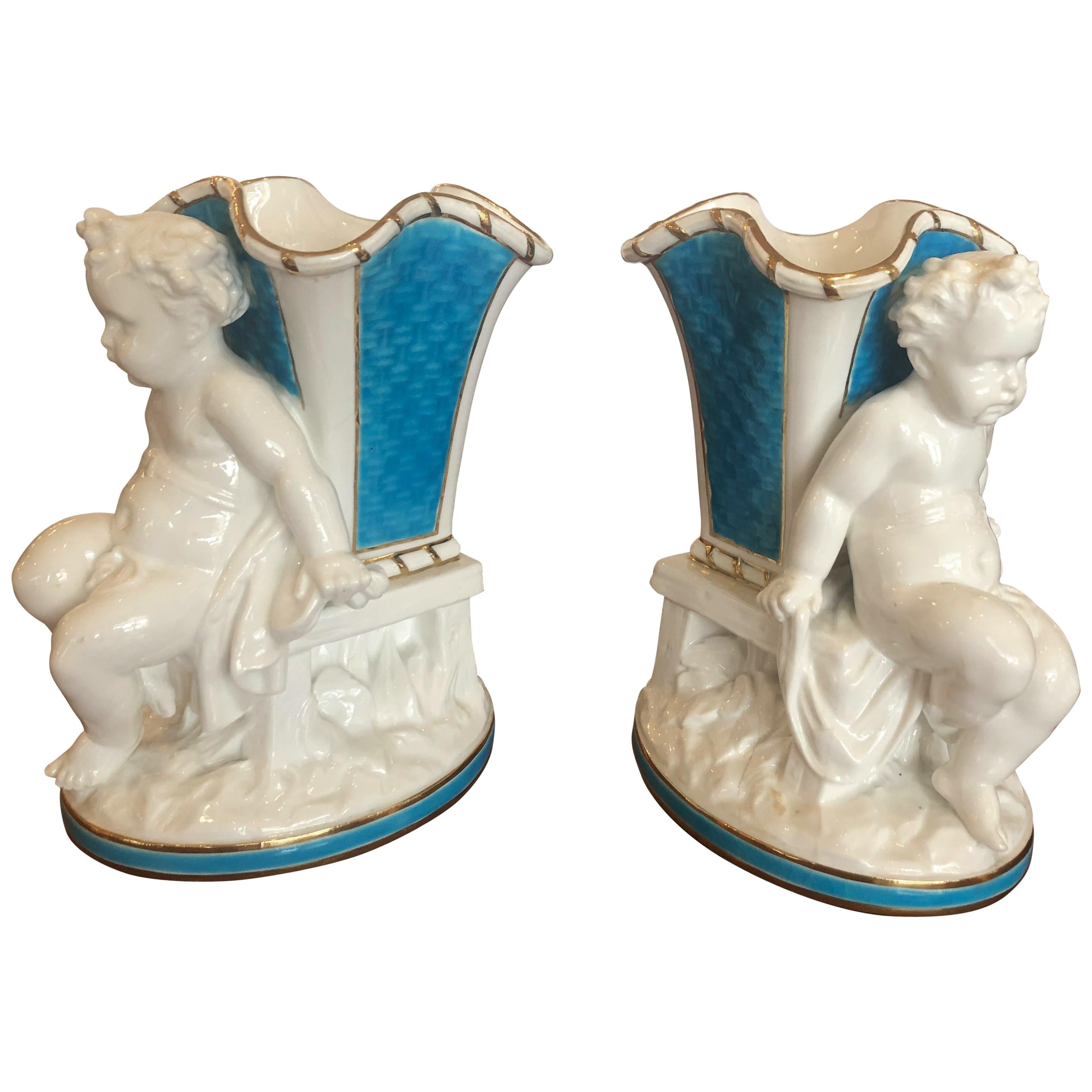 Superb Rare Pair of Cherub Minton Caldwell Tiffany Blue and White Spill Vases For Sale