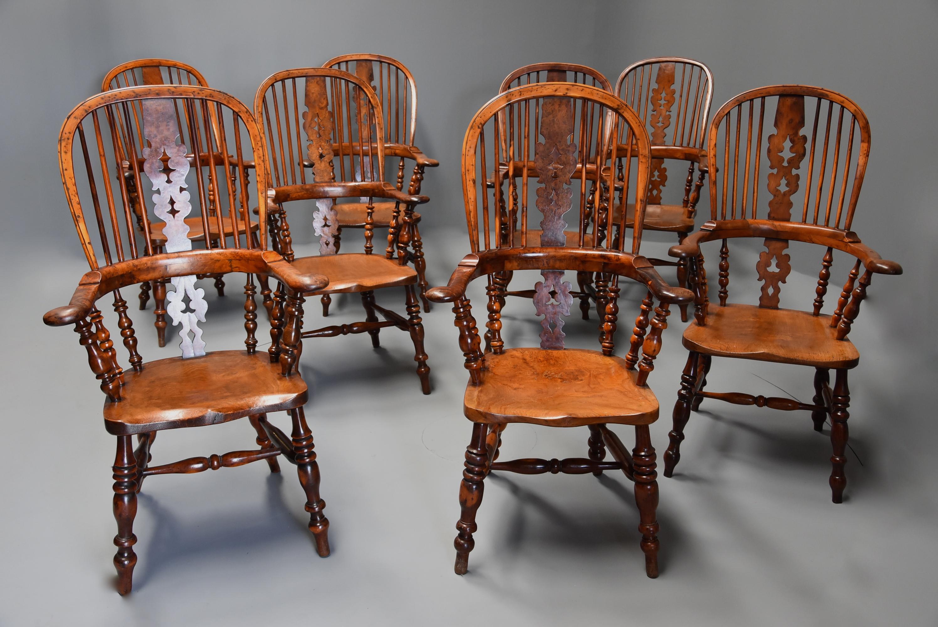 A superb rare set of eight 19th century burr yew broad arm high back Windsor armchairs of superb patina from the North of England, probably Yorkshire.

The chairs consist of a top hoop of burr yew, some with more burr than others, with four