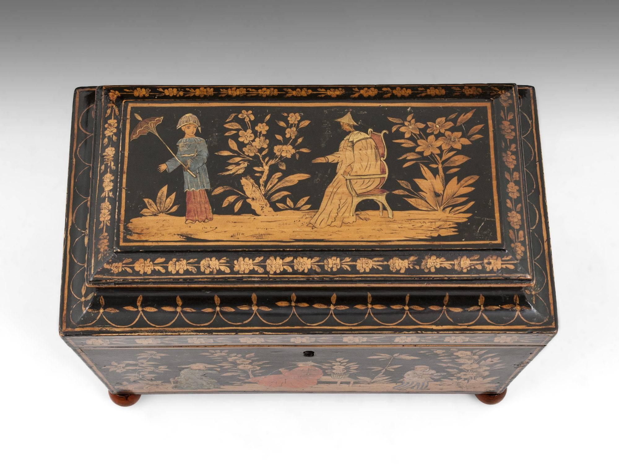 The tea caddy is painted and decorated on the top, front, back and sides with figures working amongst trees, birds and flowers. The lid opens to reveal two penwork painted lids above two compartments. The tea caddy is in its original condition and