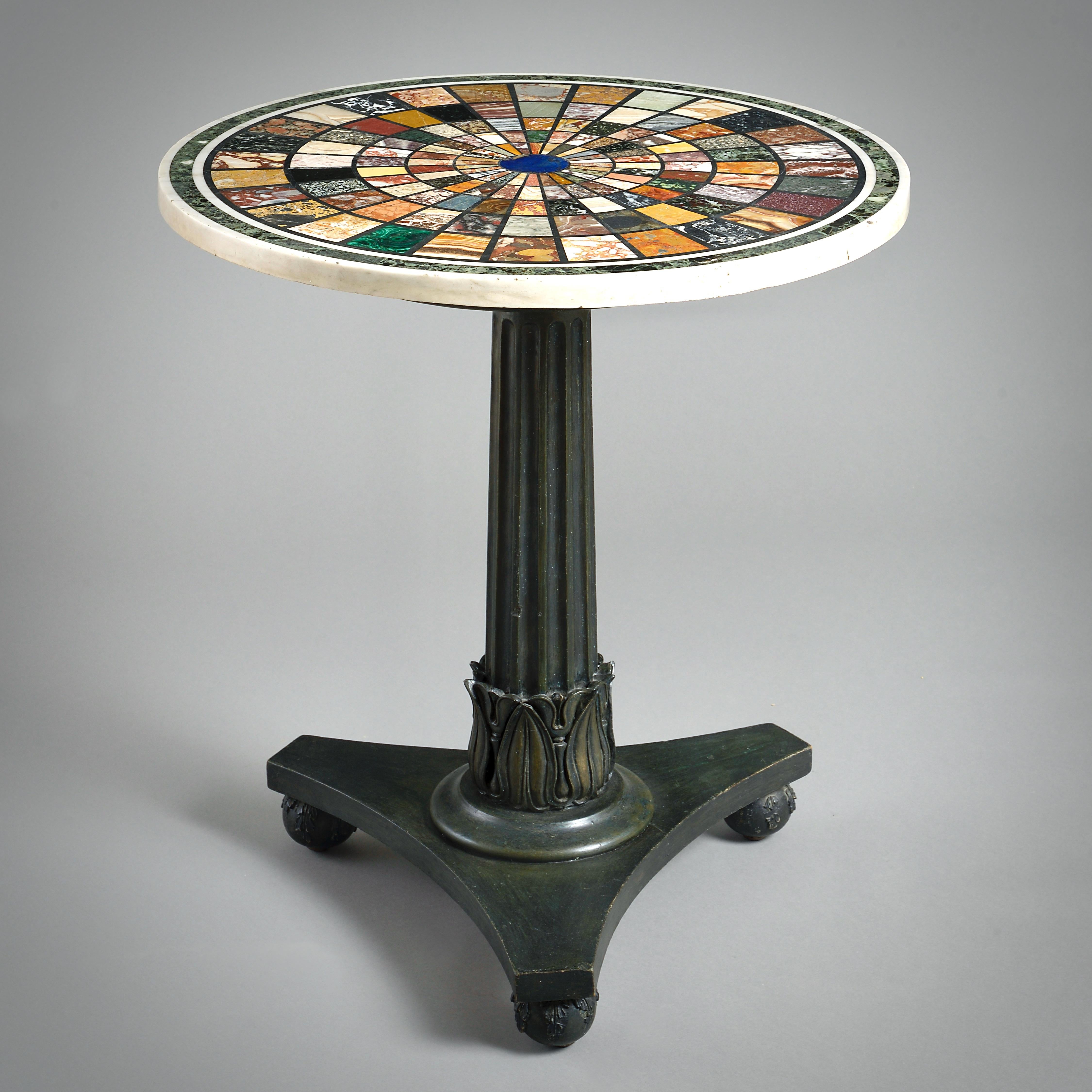 A SUPERB REGENCY SPECIMEN MARBLE CENTRE TABLE WITH BRONZED NEOCLASSICAL BASE, CIRCA 1815.

The top Roman, circa 1815, and incorporating many ancient and rare stones. The base remarkably retaining it’s original bronzed decoration.