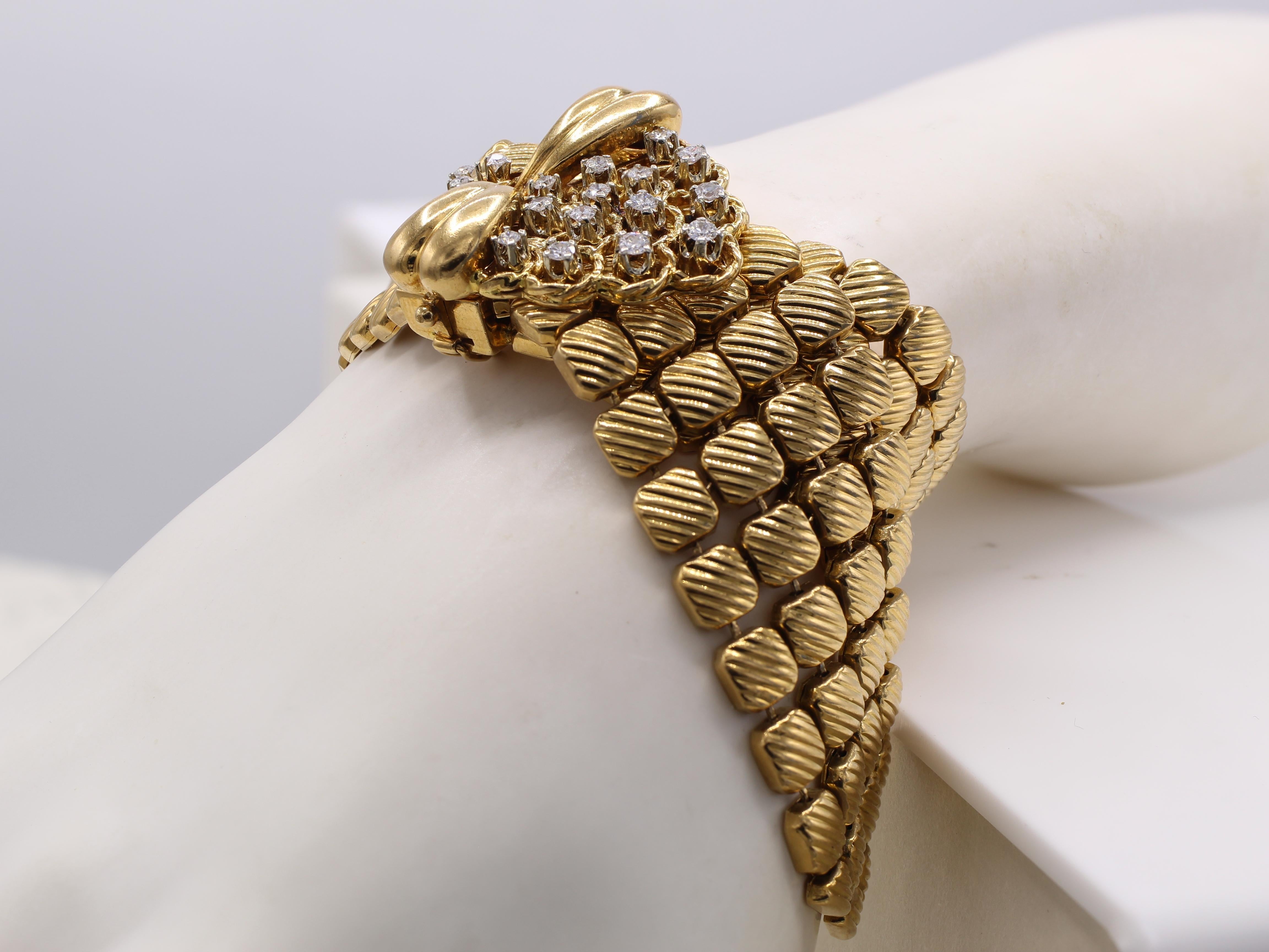 Superb and unique Retro diamond and 18 karat yellow gold buckle-slide bracelet ca 1945. Beautifully designed and magnificently handcrafted this chic and stylish bracelet feels like silk on the wrist. This bracelet consists of 138 elements of