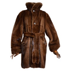 Superbe manteau réversible vintage ceinturé en fourrure de vison et veste en peau de mouton bordée de daim