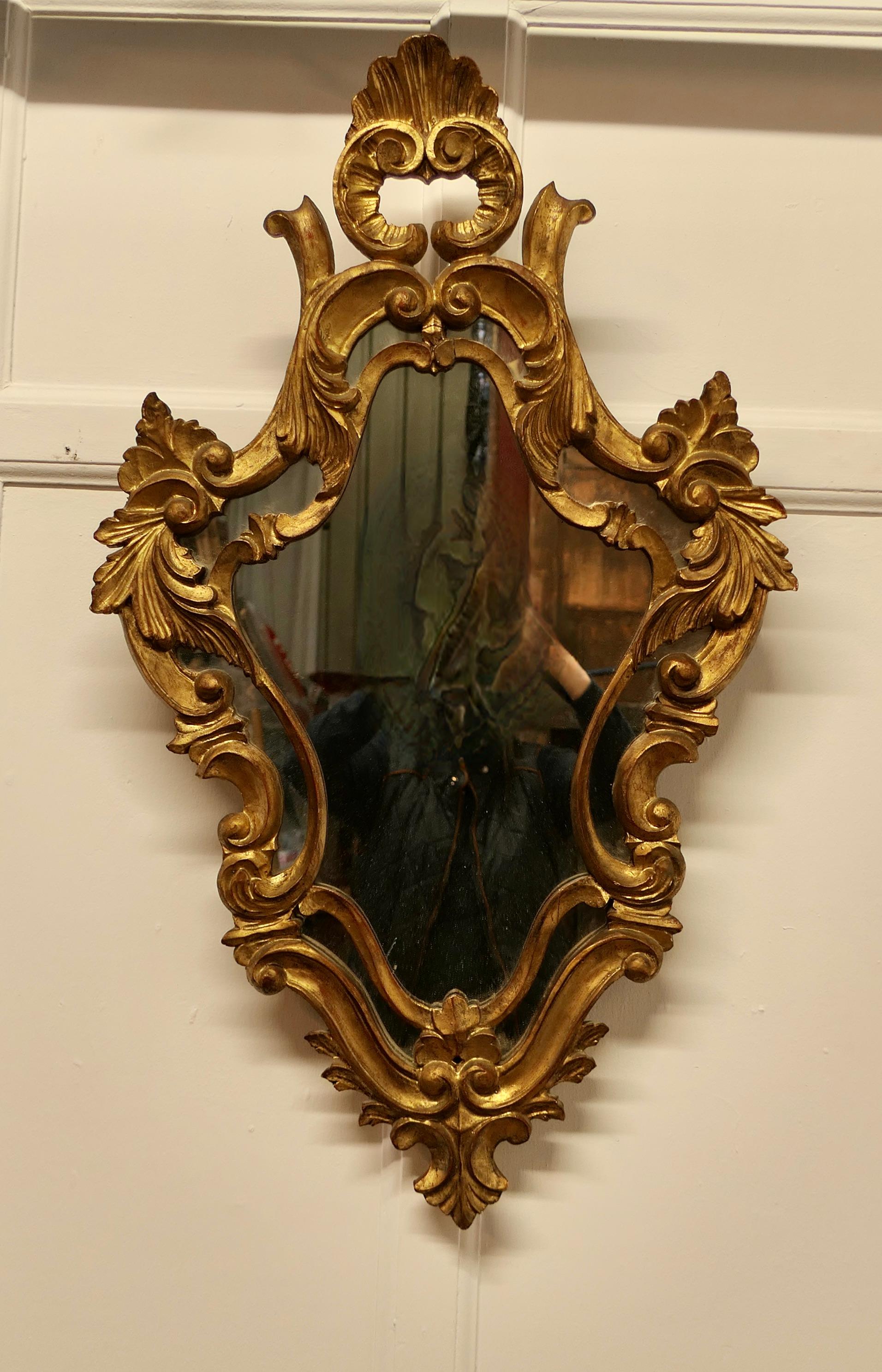 Giltwood Superb Rococo Style Gilt Wall Mirror the Mirror Has an Elaborate Frame For Sale