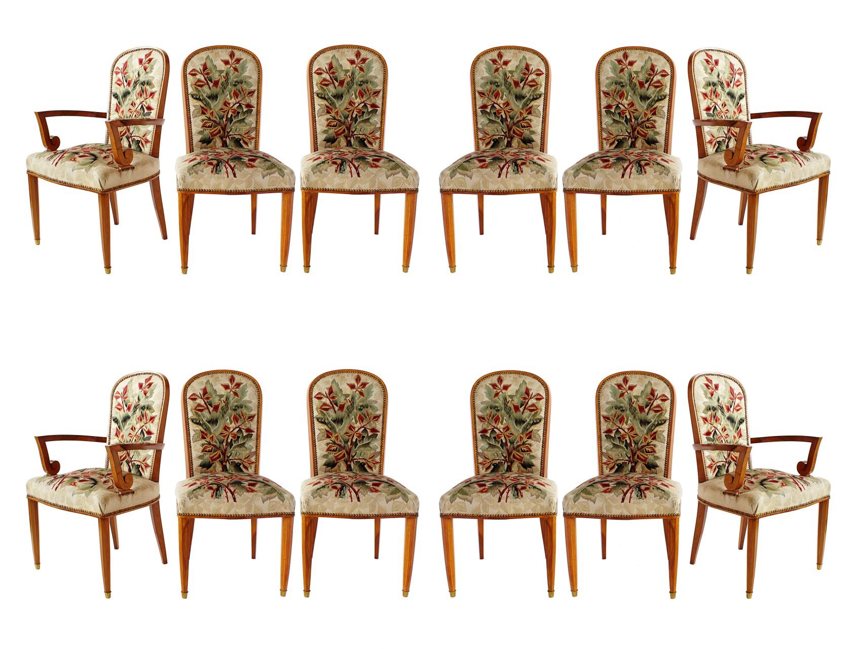 12 fruitwood dining chairs consisting of 4 arms and 6 sides, with original Aubusson tapestry upholstery, by Paule Leleu. Provenance: Dining Room of Mr and Mes Dervveaux, 1956, as illustrated on page 224, The house of Leleu, Francoise Siriex.