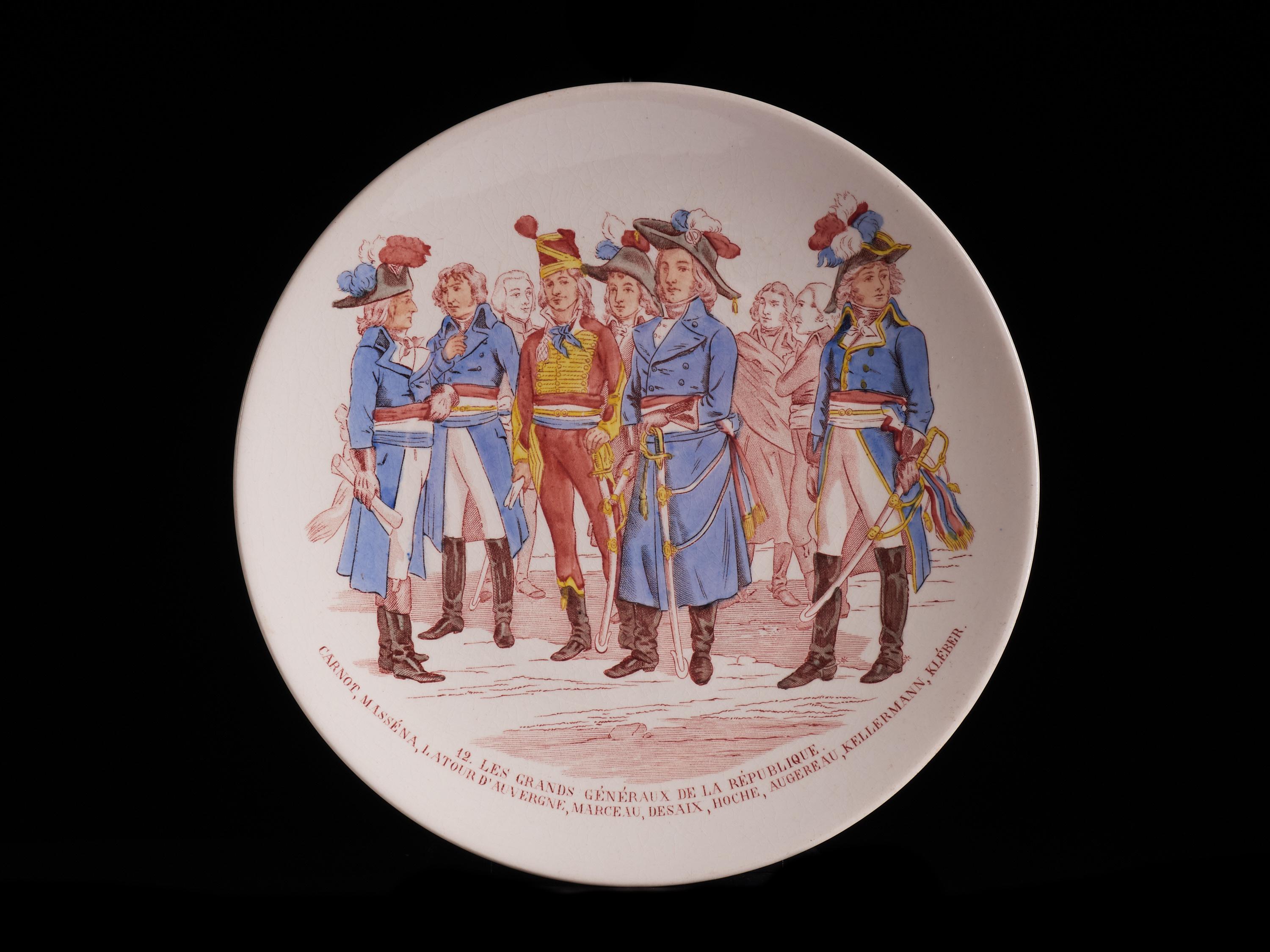 Excellent set of 7 white faïencerie plates from the late 19th Century depicting scenes of 1792 events in France, at the time it was at war with the Bohemian and Hungarian kingdoms. The items are superbly painted with stamped red designs based on a