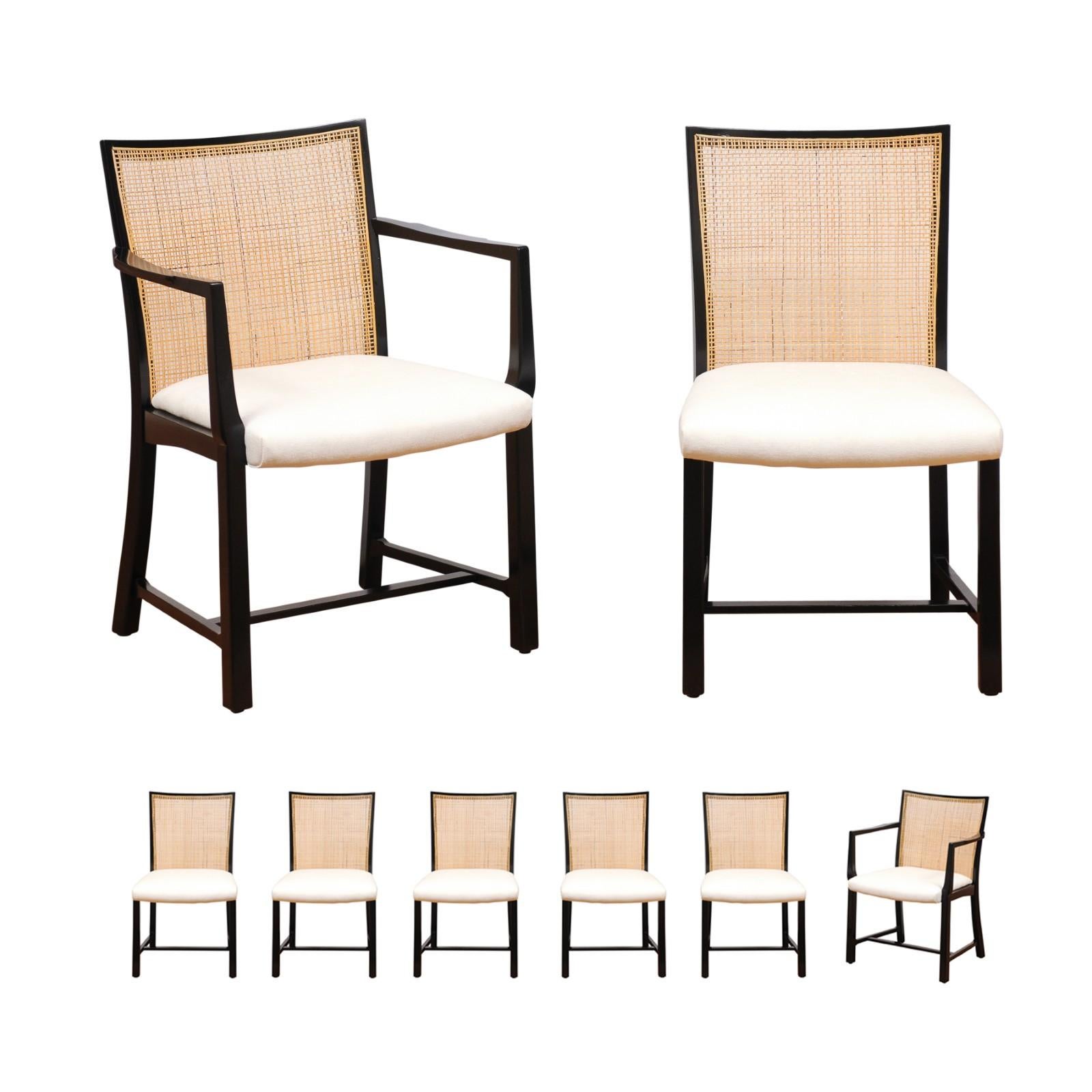 Le plus rare des rares : un exceptionnel ensemble de huit (8) chaises de salle à manger modernes en rotin de Michael Taylor pour Baker Furniture, vers 1960, méticuleusement restauré. L'ensemble se compose de deux (2) chaises d'accueil et de dix (10)