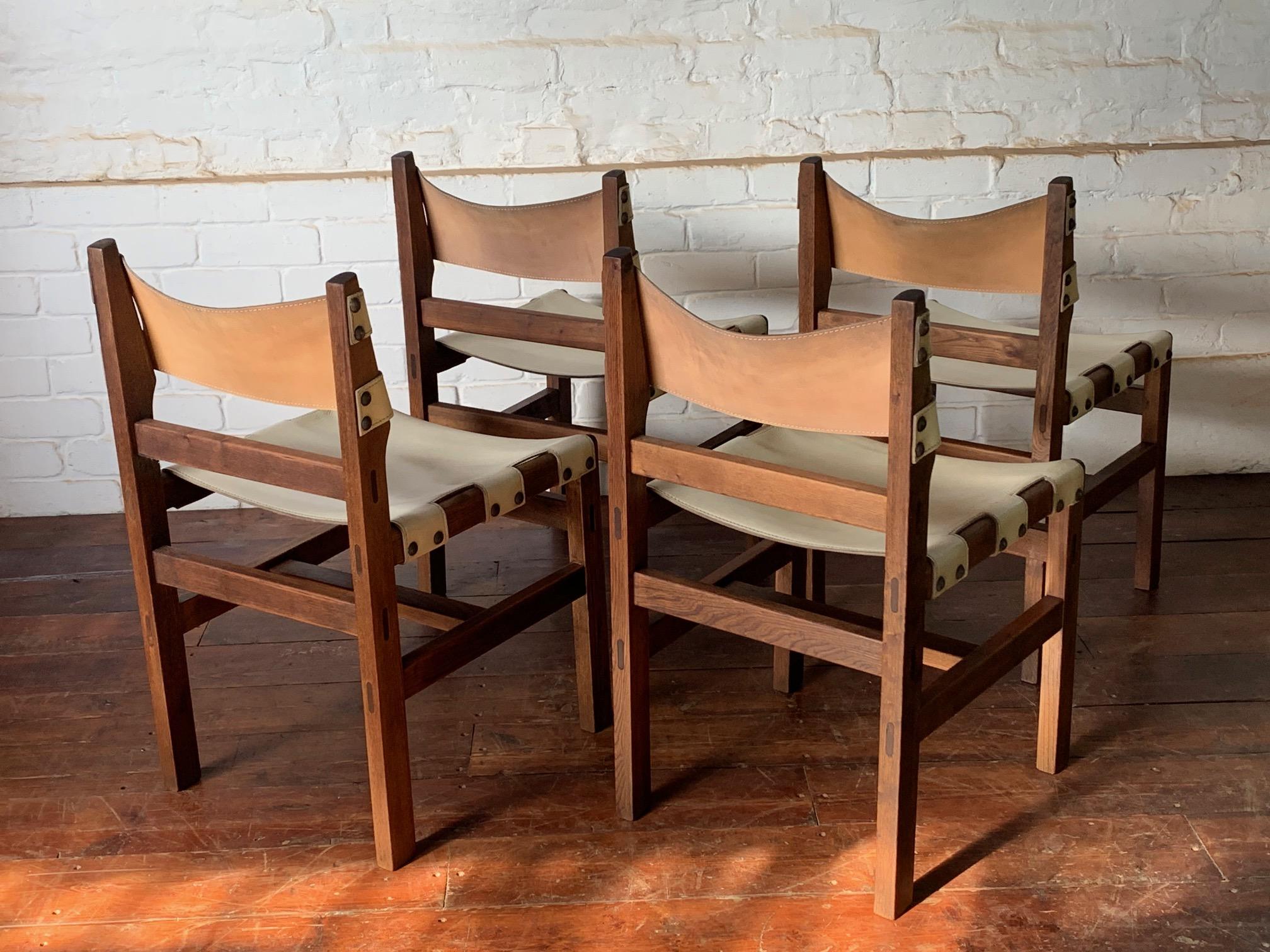 A Superb Set of Four Leather & Elm Safari Dining Chairs Circa 1970’s by Maison Regain

This rare set of 4 safari chairs, are in beautiful condition, the original cream leather is supple, and the back rest remains taught, suggesting that these chairs