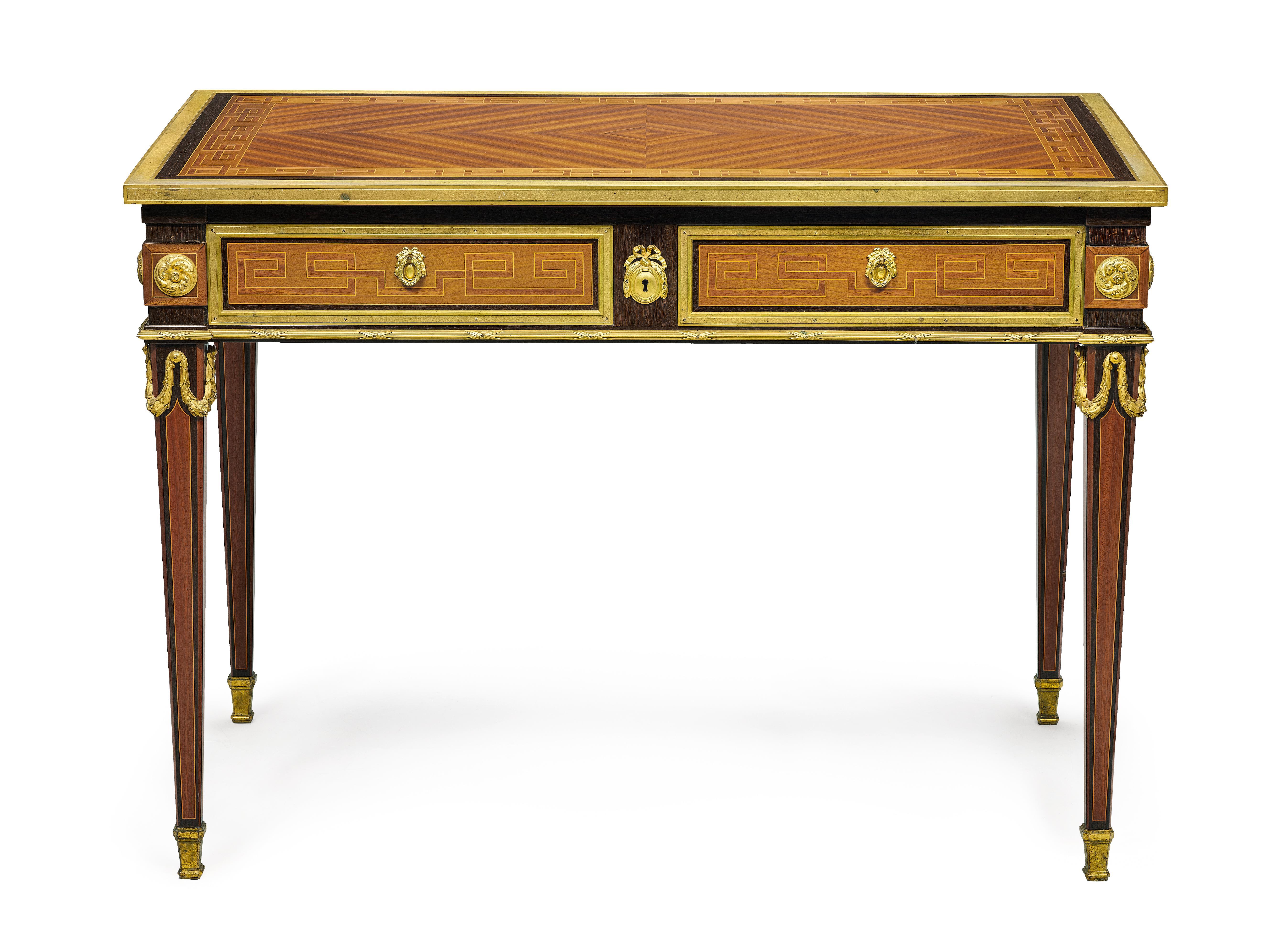 Philippe Claude Montigny (after a model by) – Superb small desk in Louis XVI style, 2nd half of the 19th century.
Oak frame on tapered legs, freestanding construction. Two front drawers with central lock. Veneered in satinwood with ornamental and