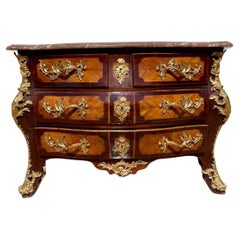 Superb tomb chest of drawers in rosewood and rosewood marquetry in Regency style
