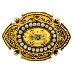 Superbo medaglione vittoriano in oro giallo 14kt con perle e turchesi, con scomparto sul retro.