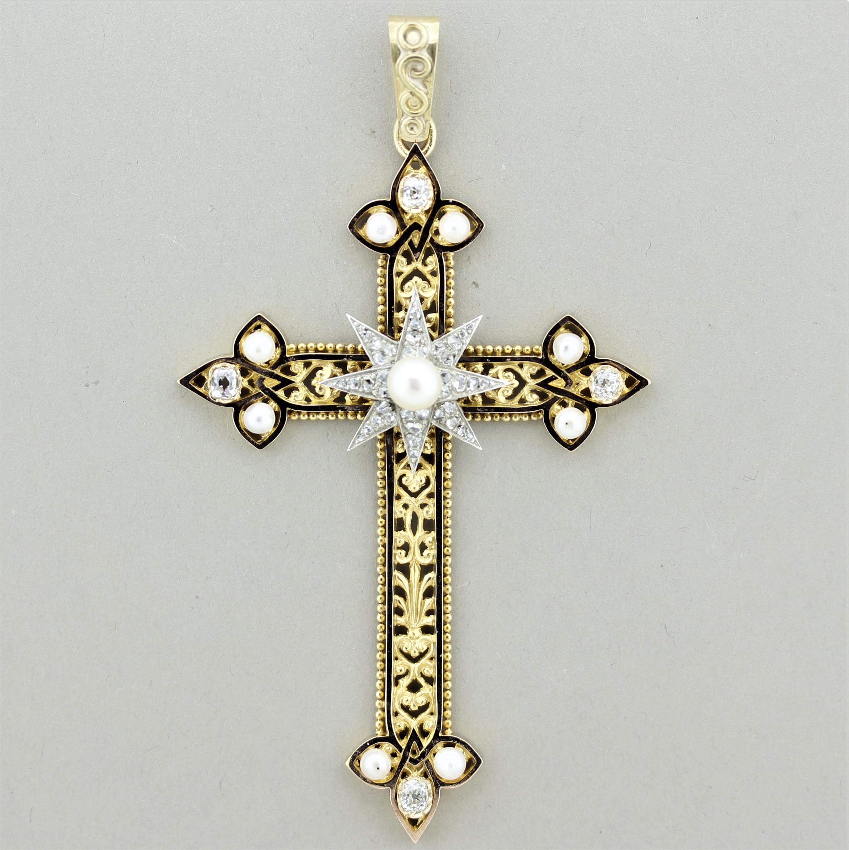 Truly a special piece from the mid-Victorian era, circa 1865. The large and detailed cross is decorated with lovely scroll motif goldwork on its insides. Four large and chunky old-cut diamonds are set on each end of the cross along with 2 natural