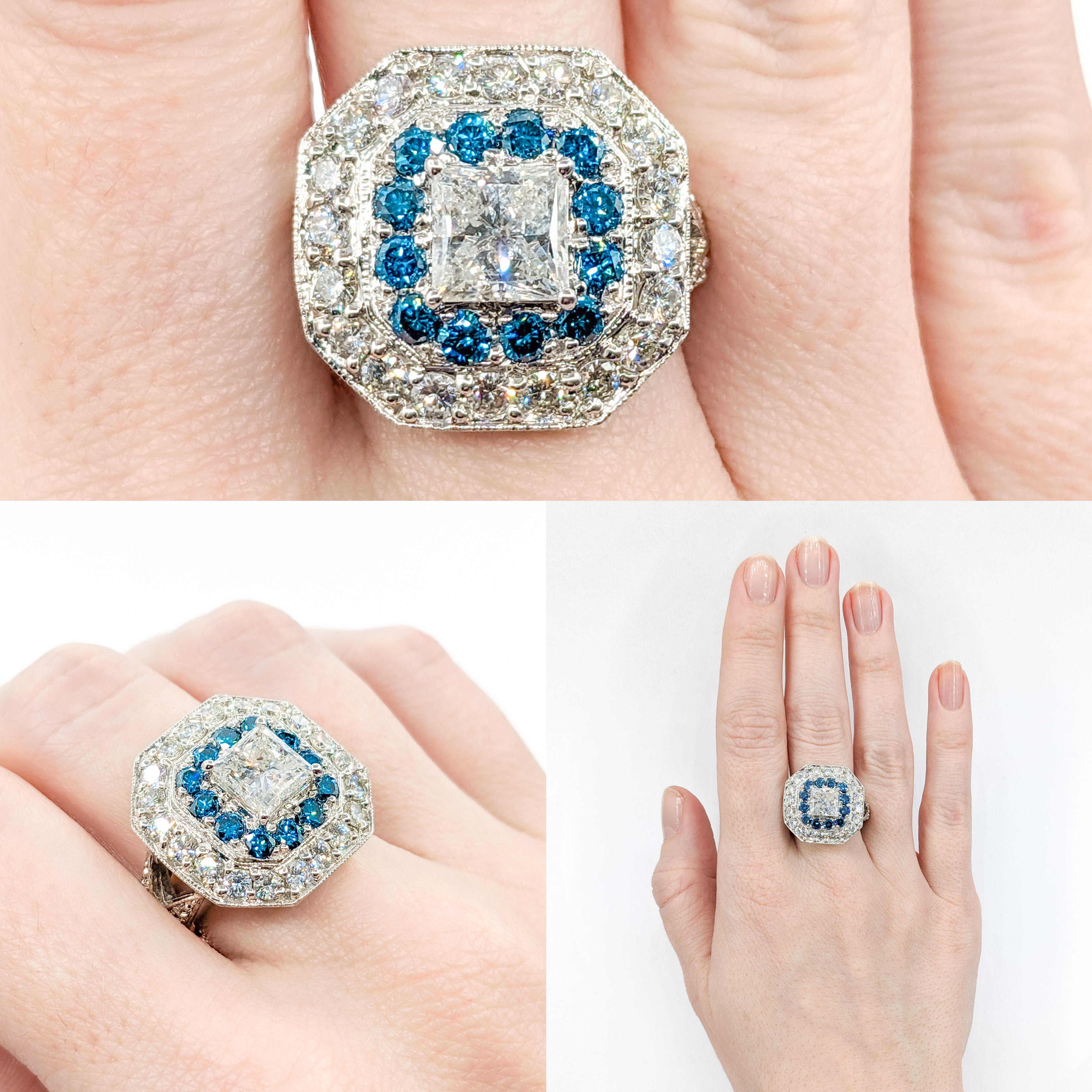 Superb White and Blue Diamond Statement Ring
This incredible ring is crafted in 14kt white gold and features an impressive 2.02ct princess-cut white diamond center stone. This ring also features 2.61ctw round white & blue diamonds, SI1 clarity, H