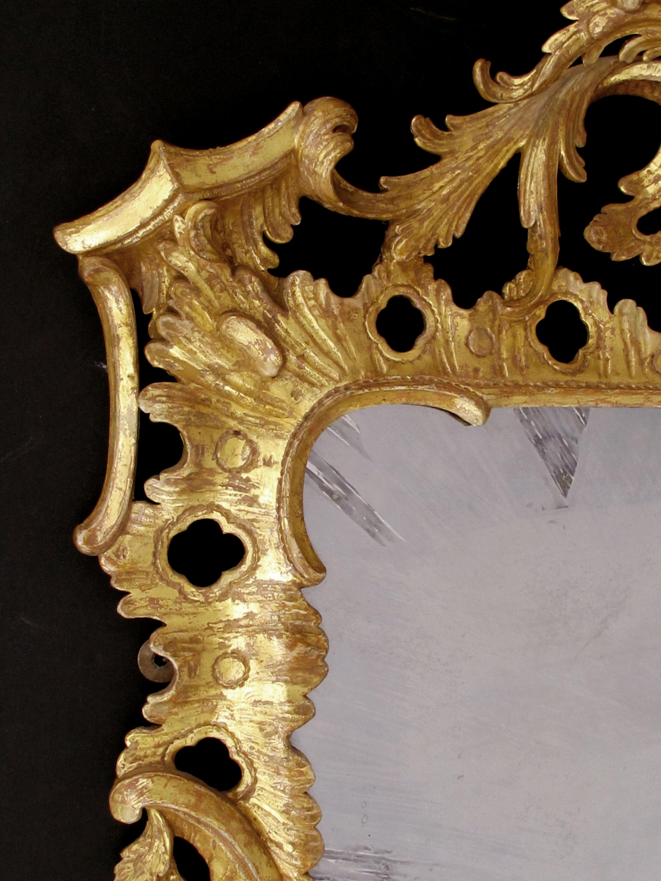 18th Century Superbly-Carved English George II Giltwood Mirror with Elaborate Foliate Crest