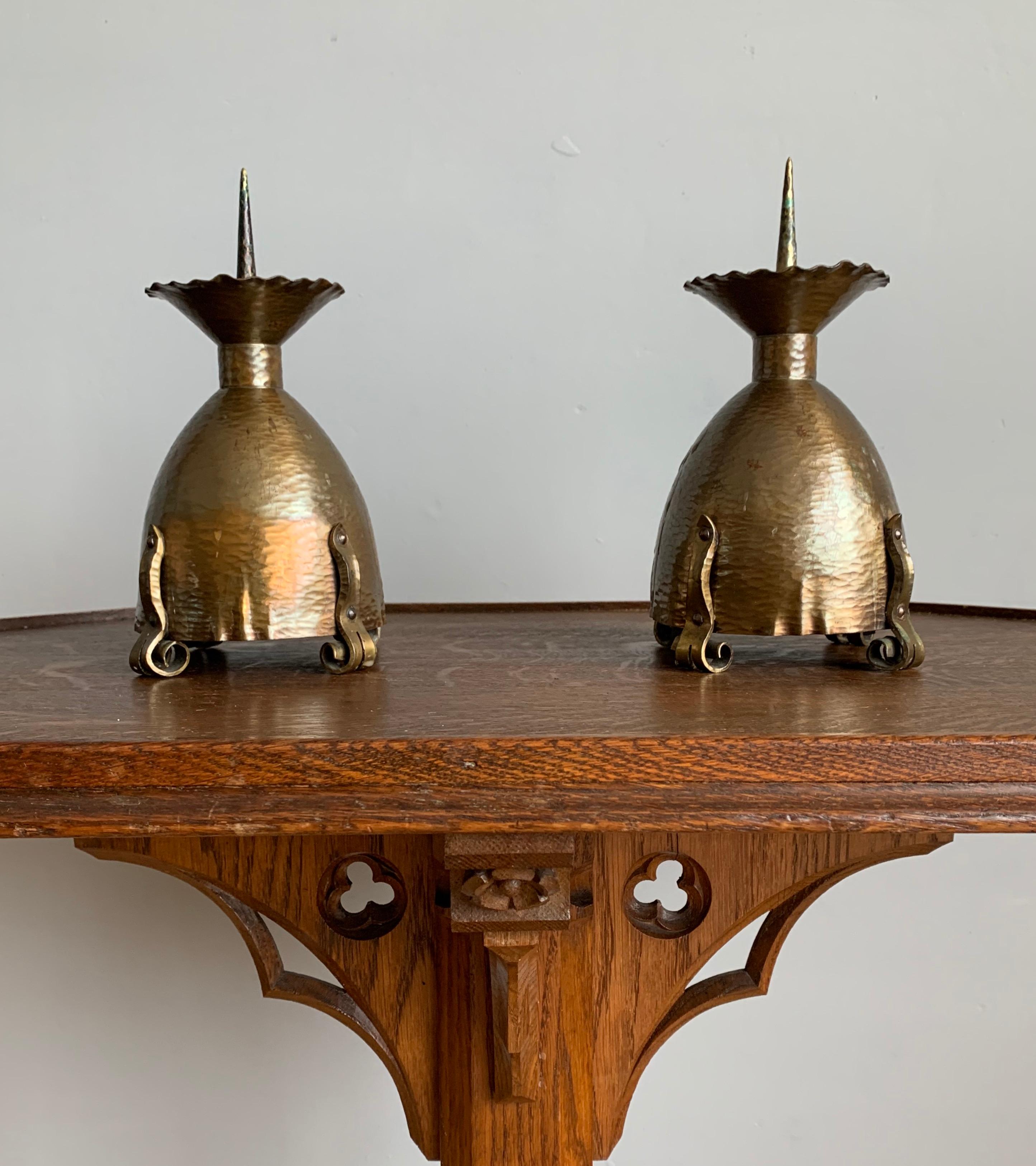 Beautiful and very stylish pair of Gothic candlesticks made in the Arts & Crafts era.

If you are looking for rare and good quality antiques in the Gothic style to grace your living space then this hand forged and timeless pair could be yours to own